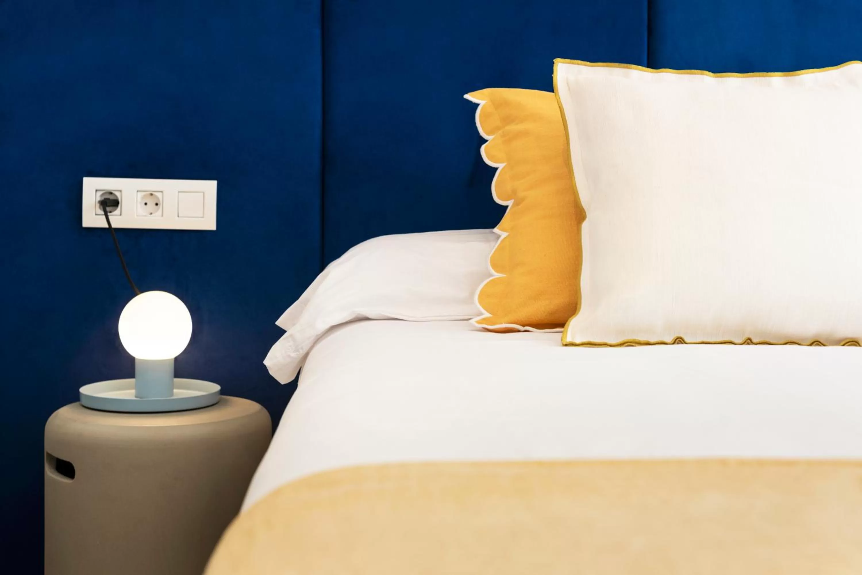 Bed in Blanq Marina Suites