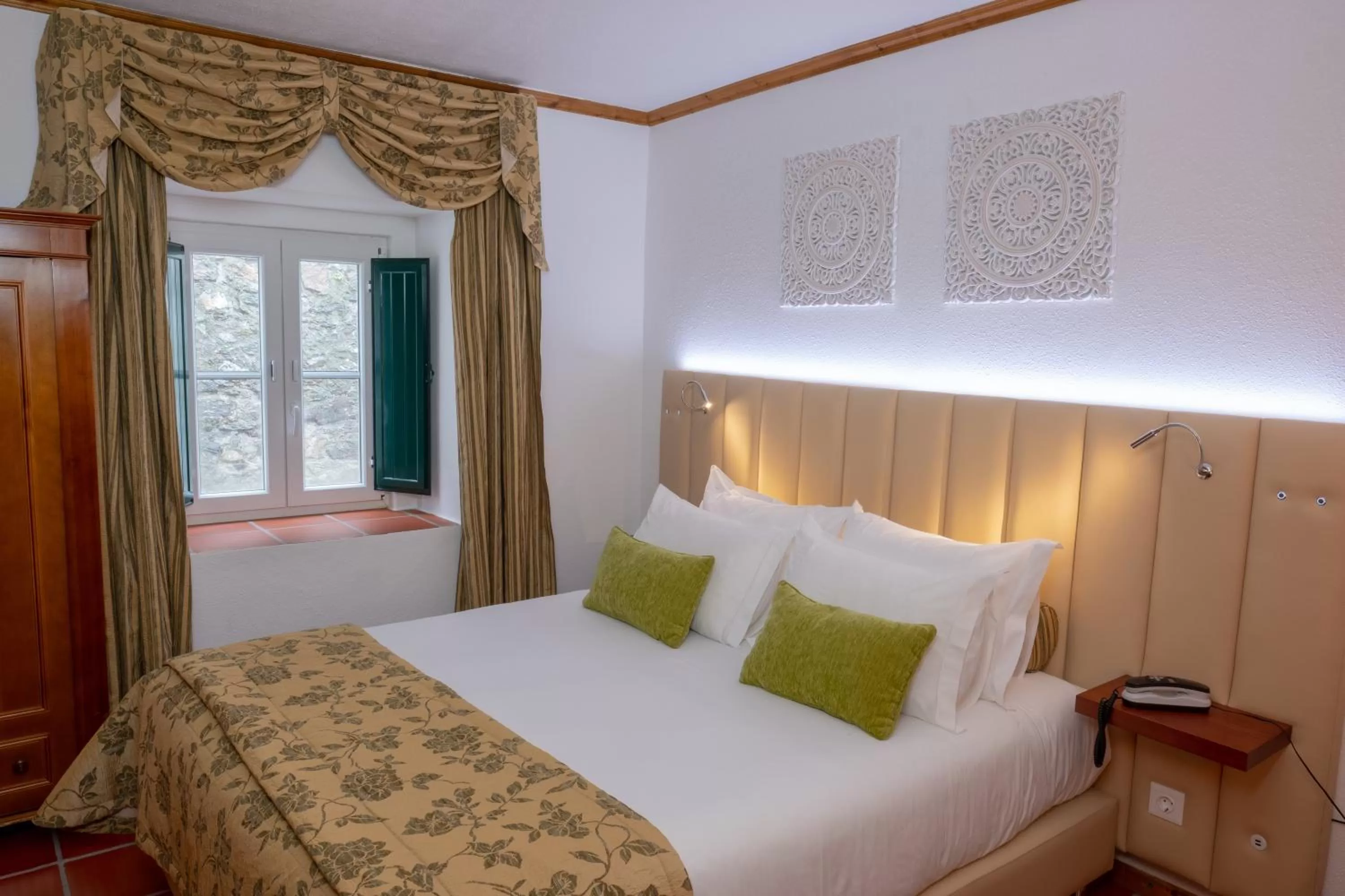 Bed in Hotel El Rei Dom Manuel