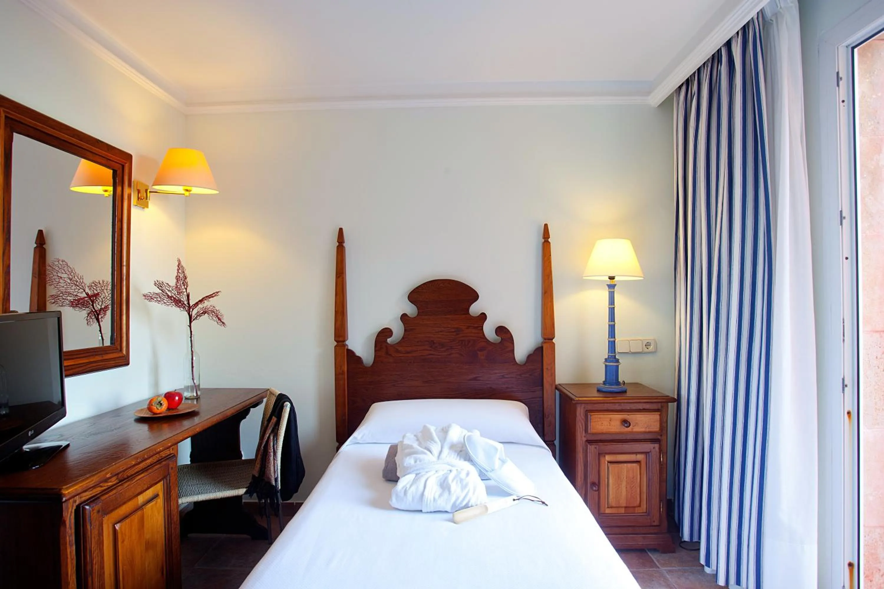 Photo of the whole room, Bed in Hotel Cala Sant Vicenç - Adults Only