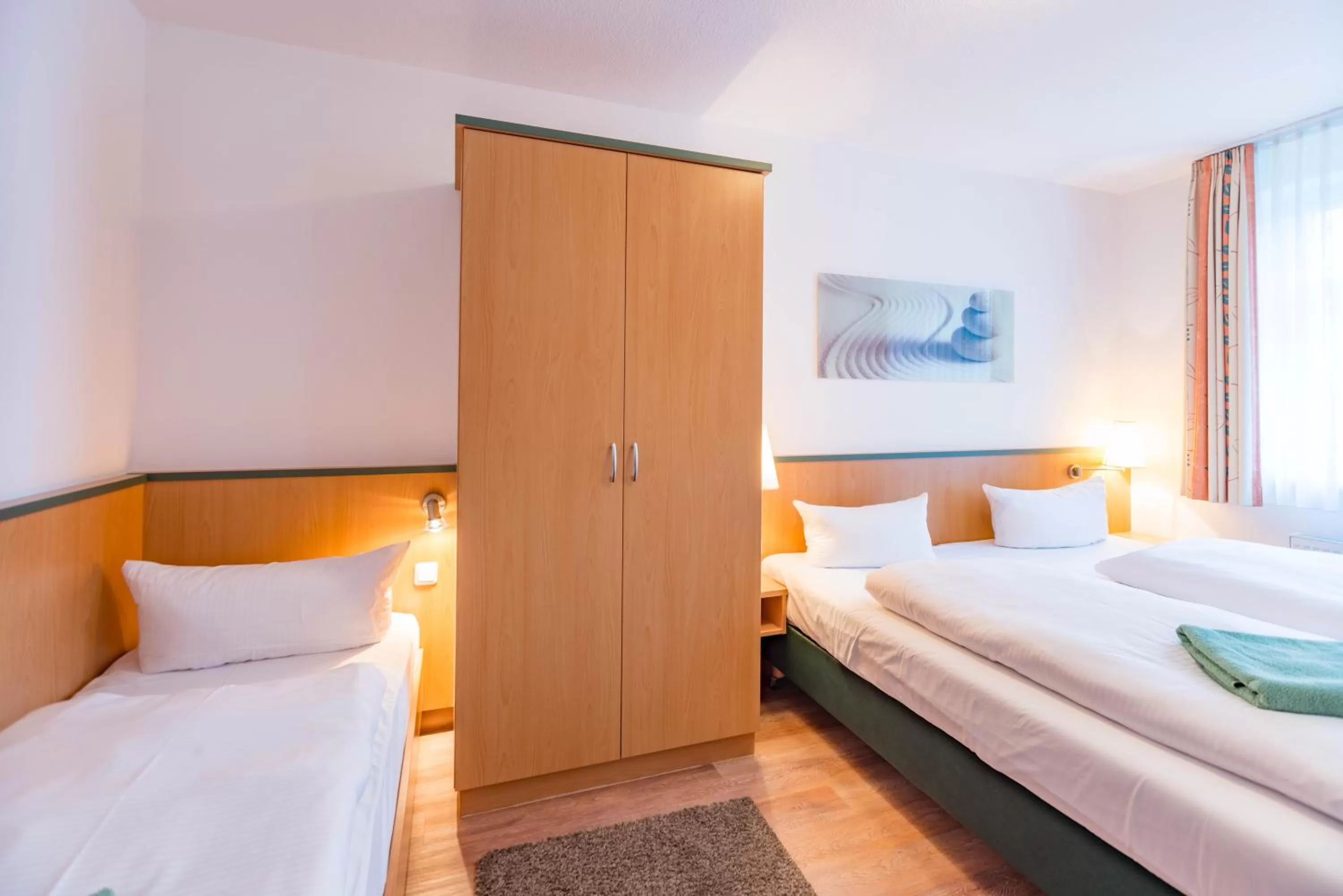 Photo of the whole room, Bed in Am Weststrand Apartmenthaus Waldeck