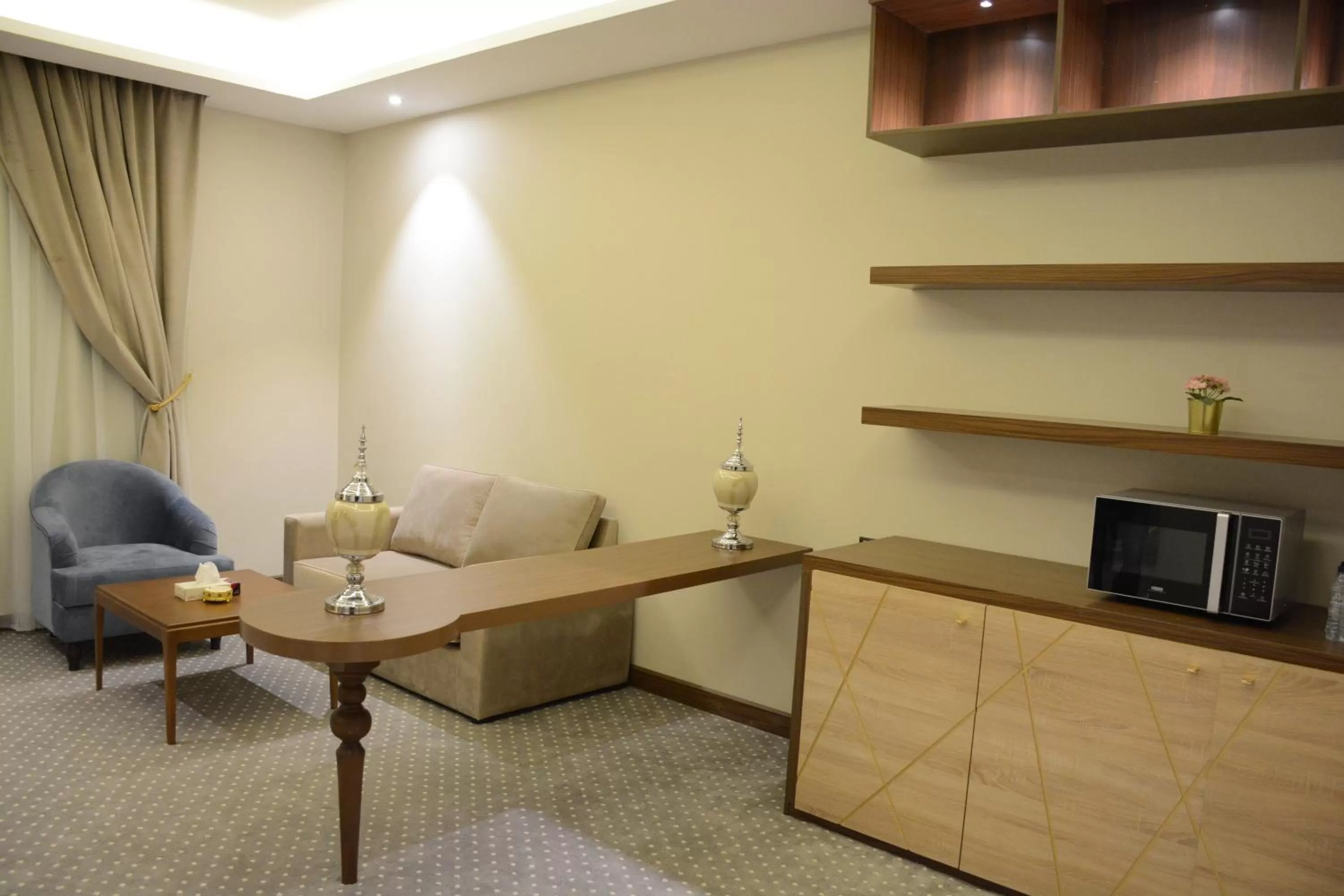 Communal lounge/ TV room, Seating Area in E1 Hotel