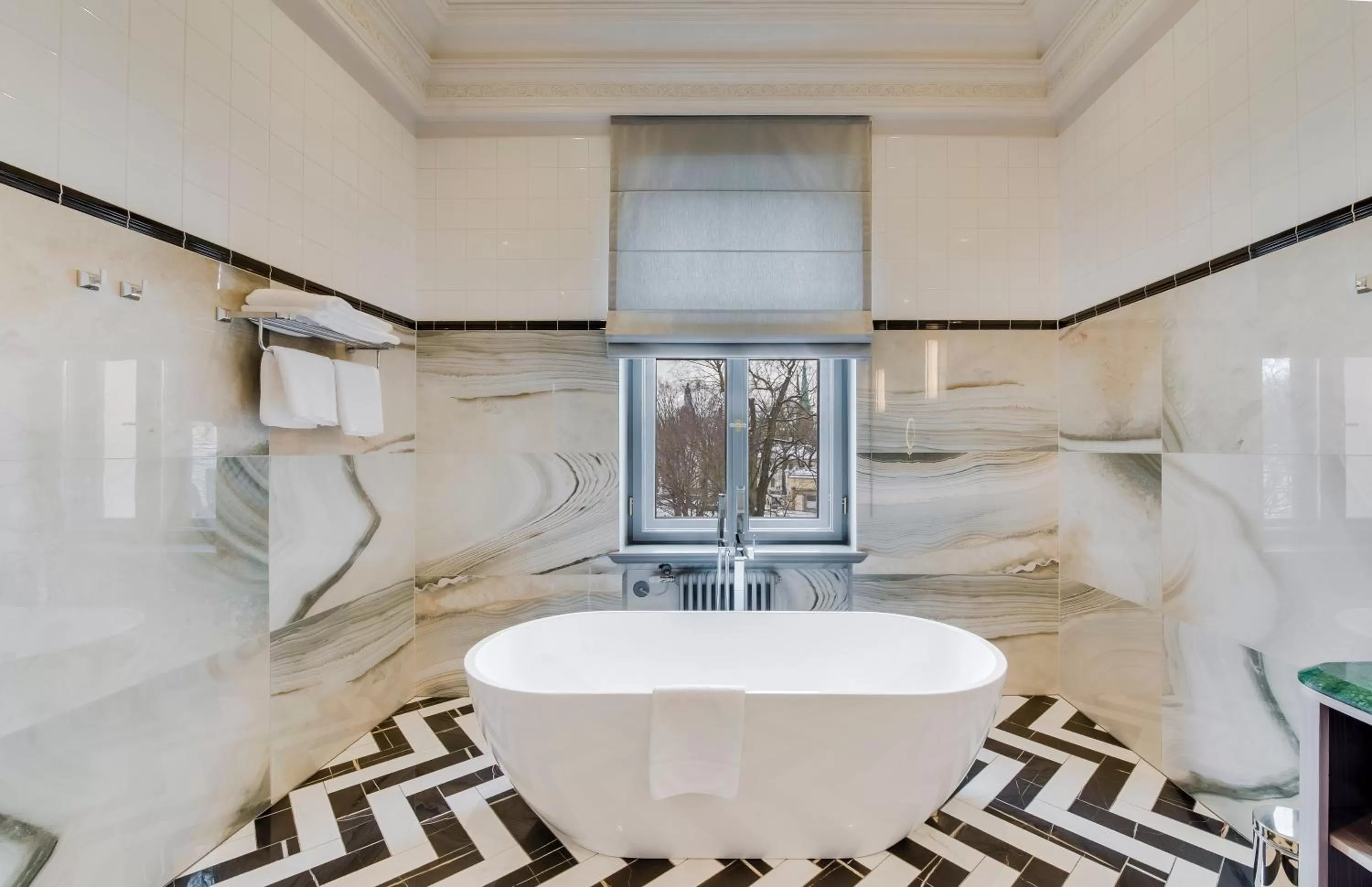 Bathroom in Grand Poet Hotel and SPA by Semarah