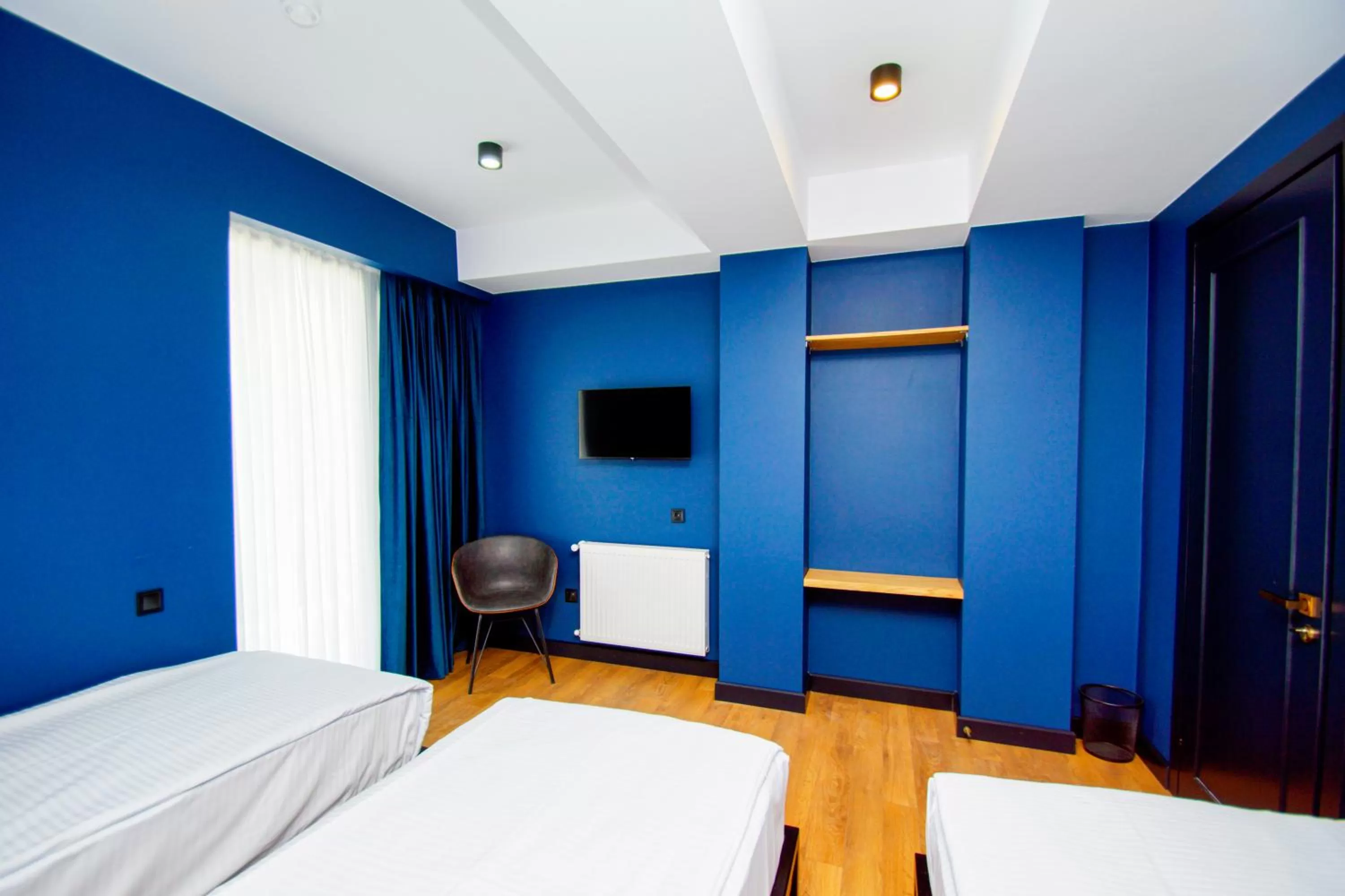 Photo of the whole room, TV/Entertainment Center in Borjomi Bridge Hotel