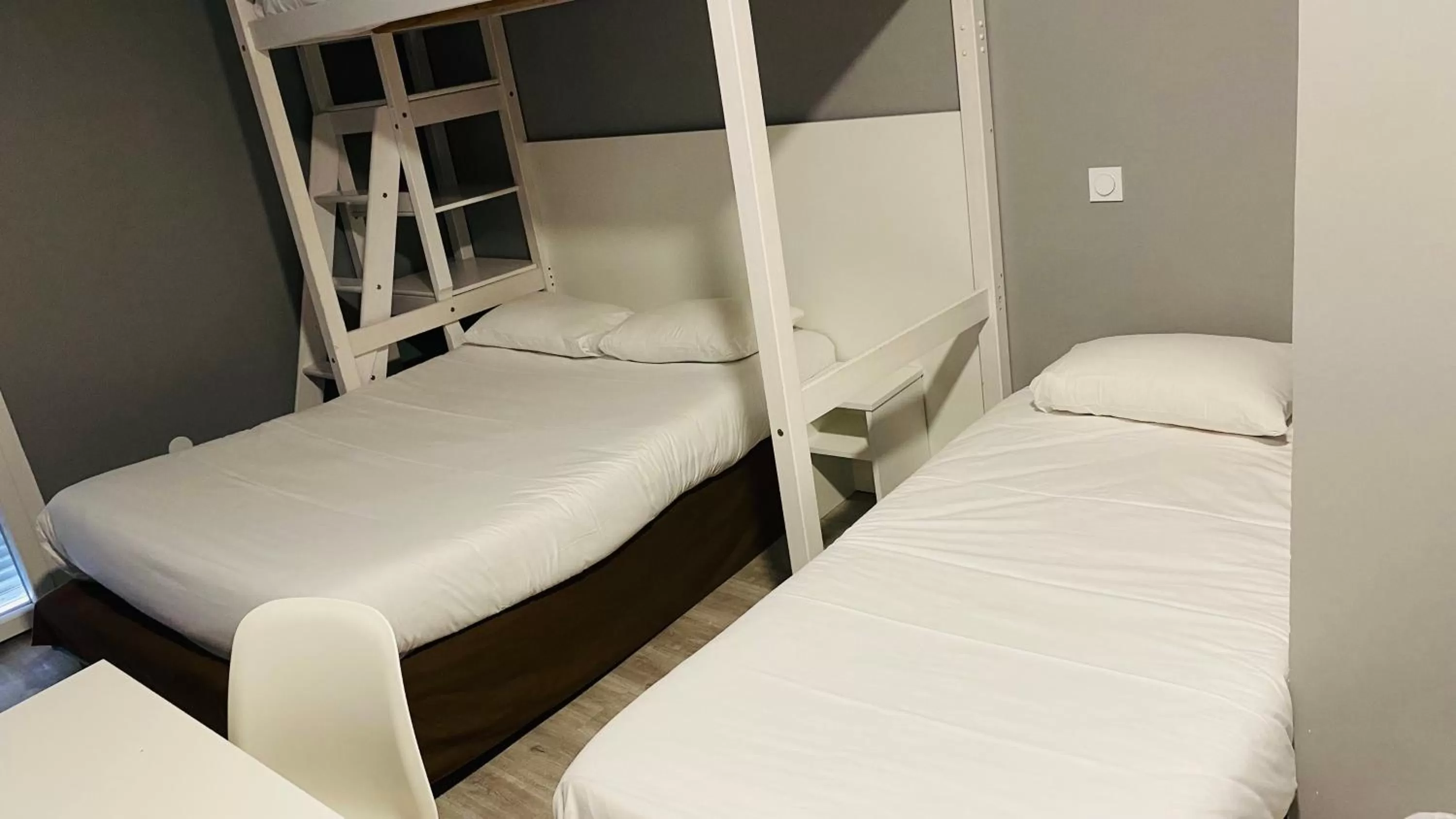 Bed in Hotel Martinez Grenay