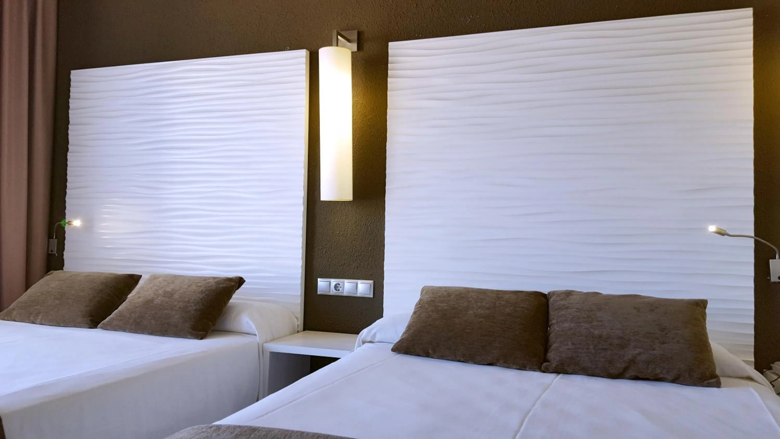 Bed in Hotel Augustus