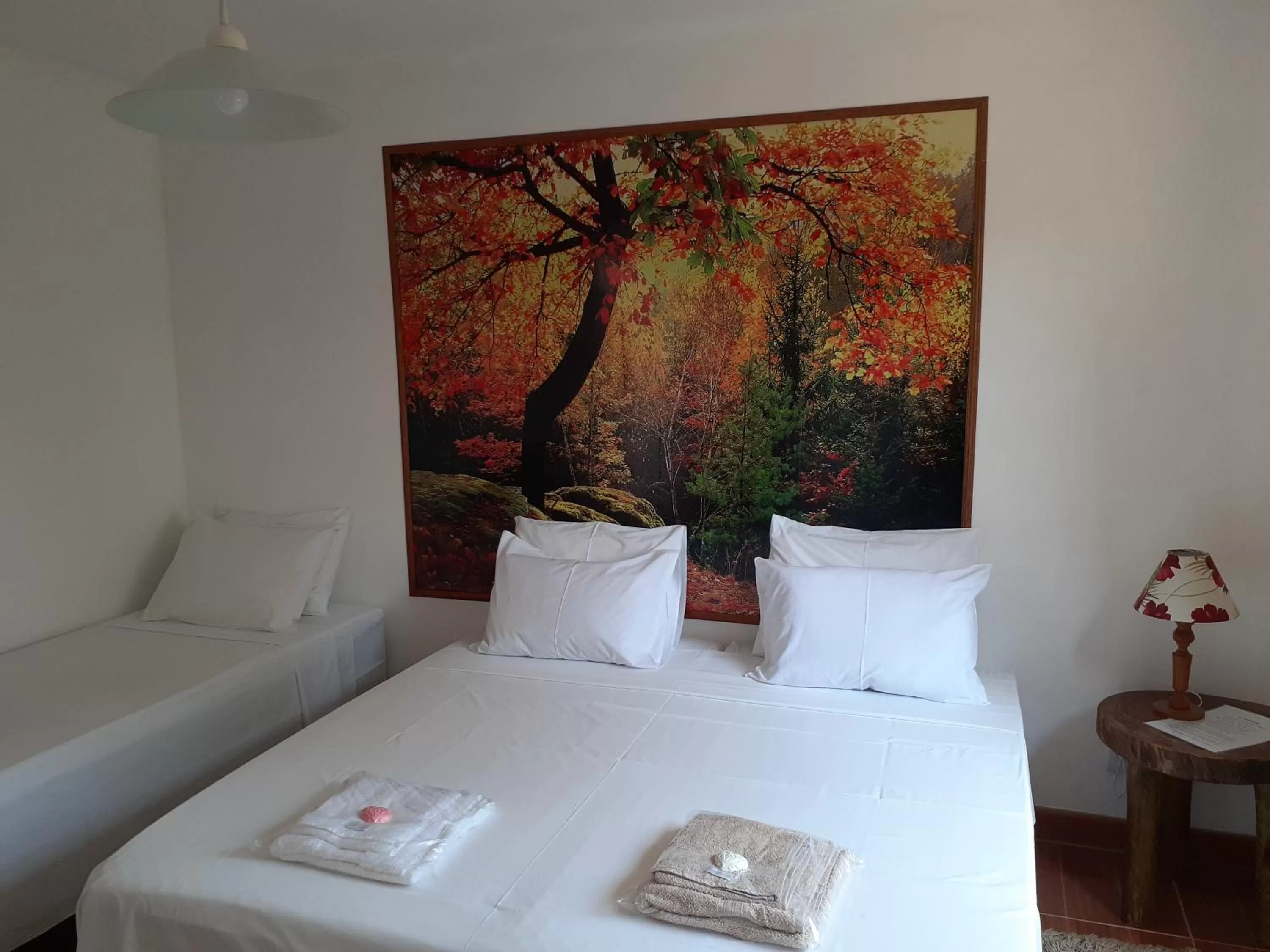 Bed in Pousada R.N.C. Nosso Paraíso