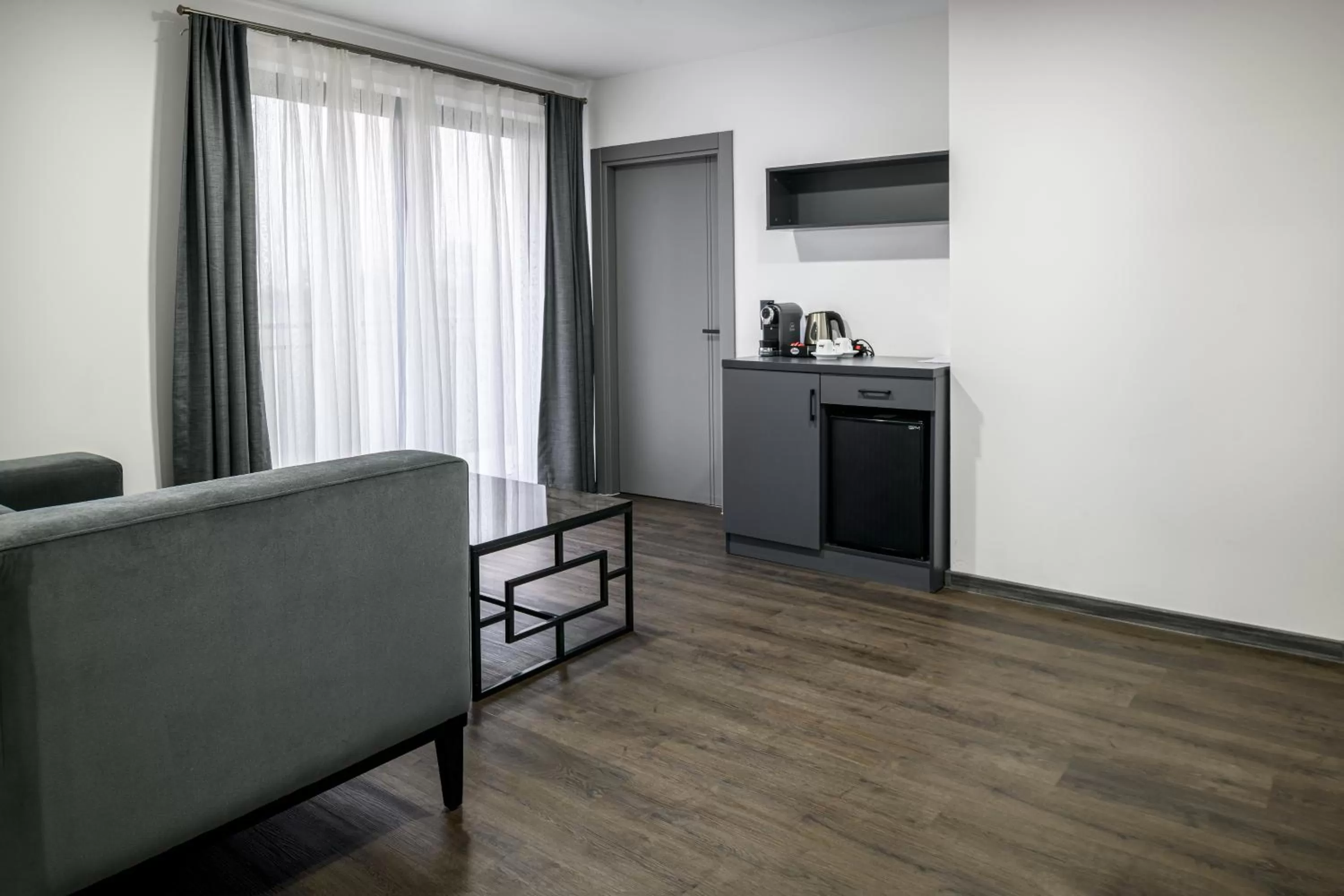 Living room in PARKHOTEL BRAUNAU - 24 Stunden Self Check-IN