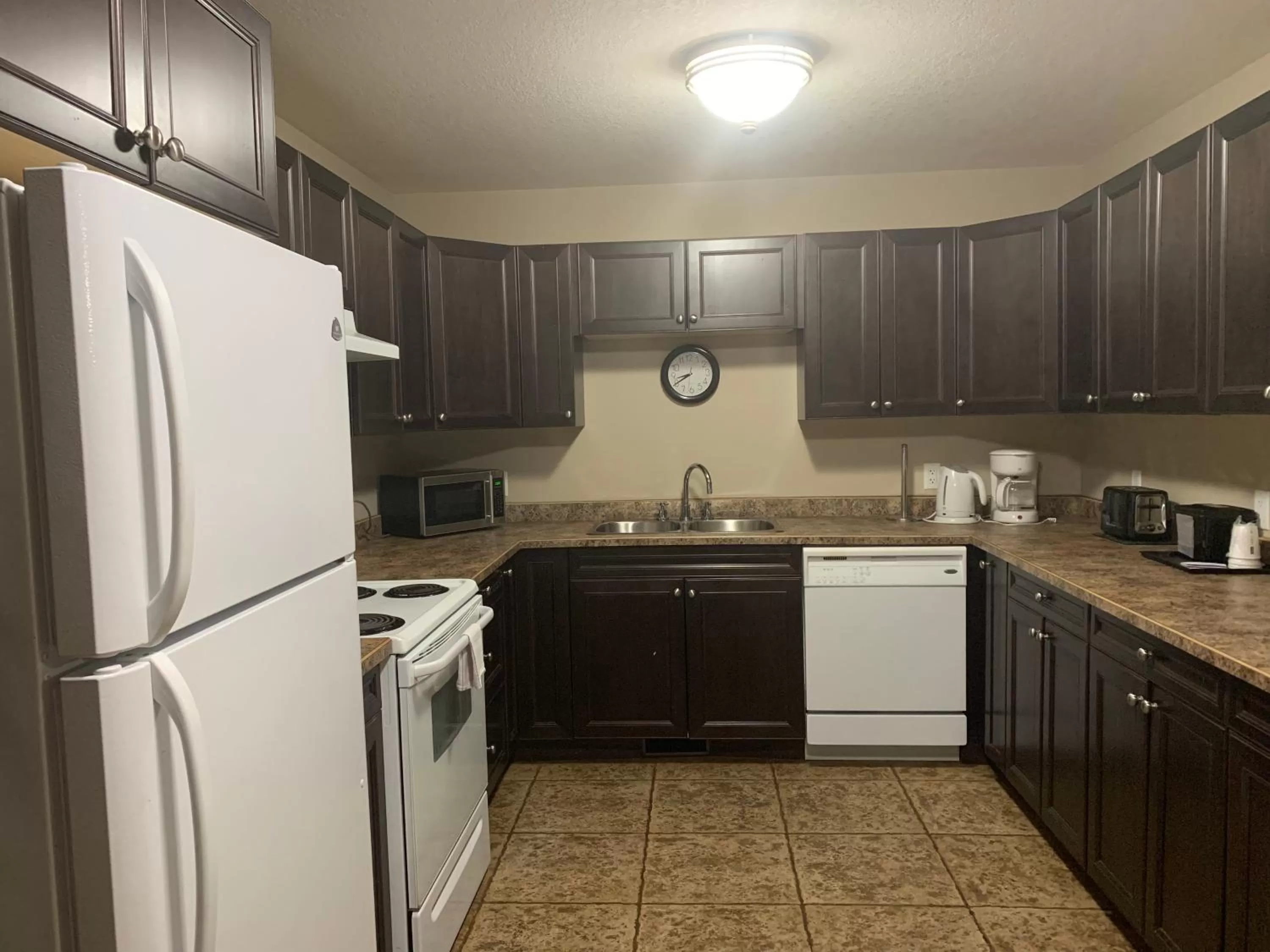 Kitchen or kitchenette in Super 8 by Wyndham Fort McMurray
