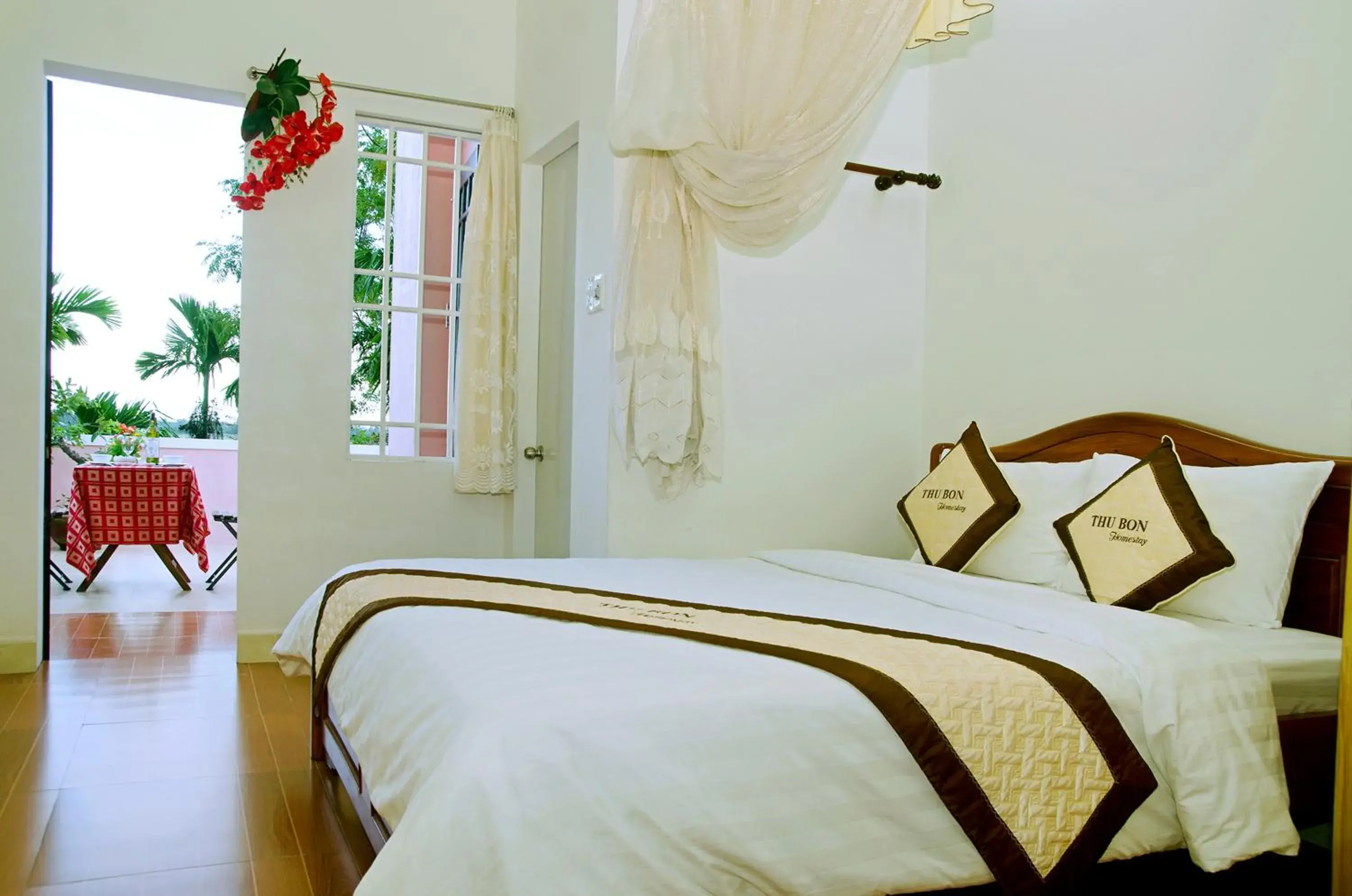 Deluxe Double Room with Balcony in Thu Bon Riverside Homestay Deluxe Double Room with Balcony in Thu Bon Riverside Homestay