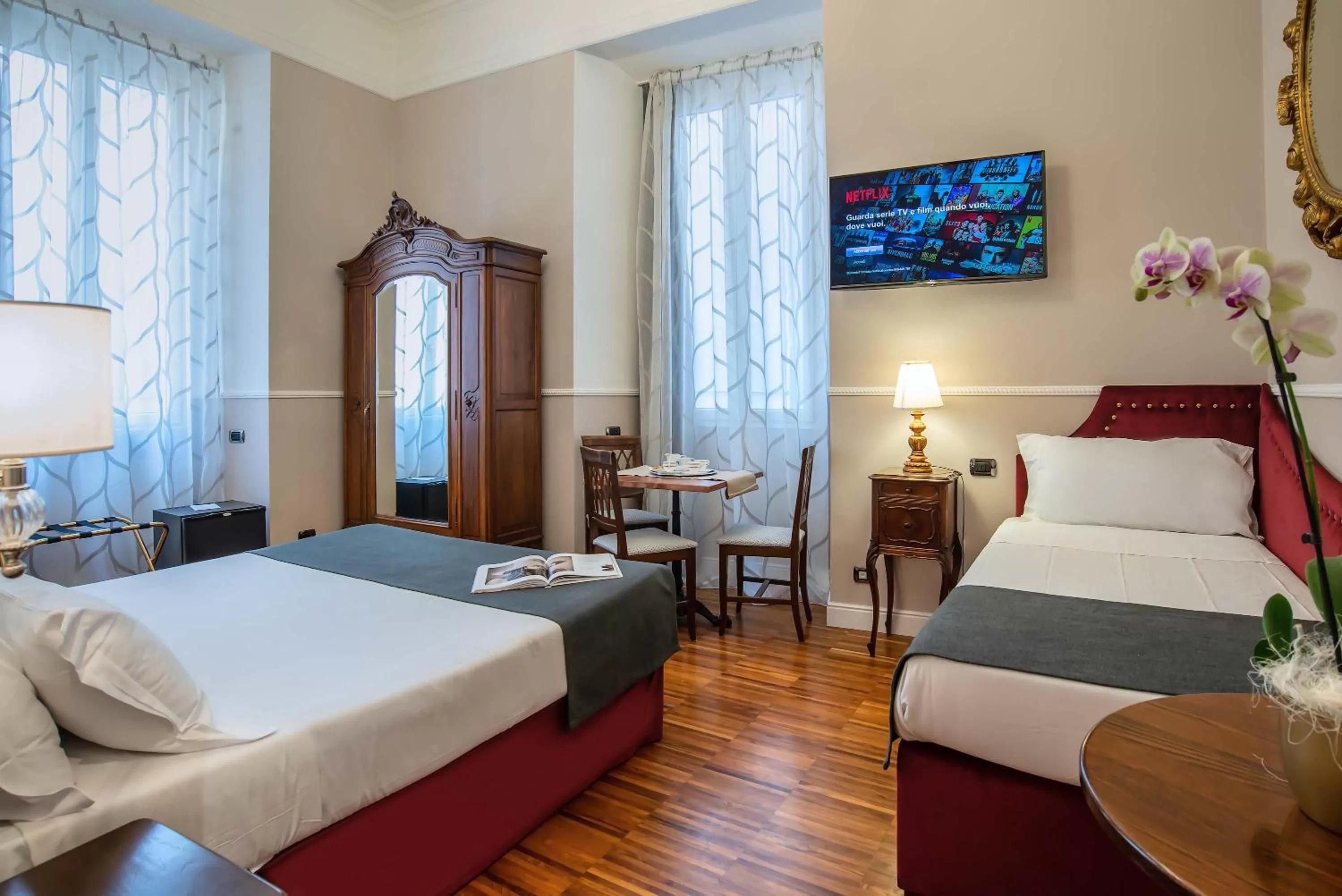 Bed in I TRE MOSCHETTIERI - D'ARTAGNAN Luxury Guest House