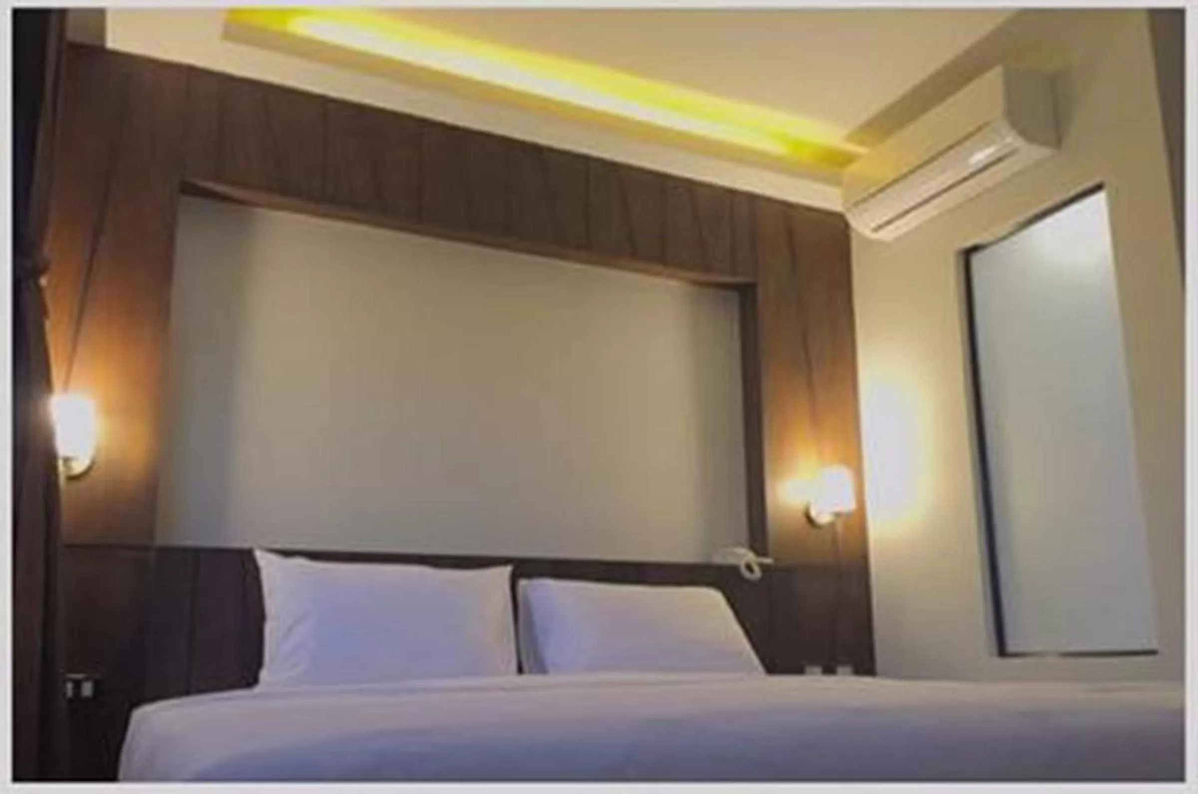 Bed in Rakkawan Residence