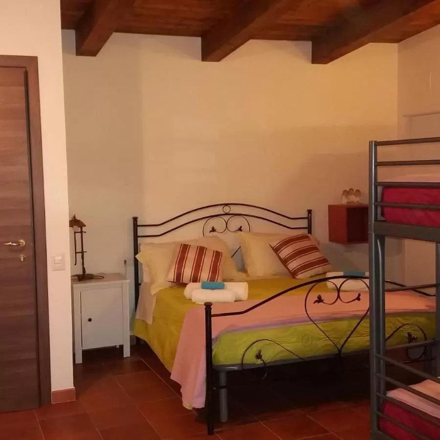 Bed in B&B Le Anthos