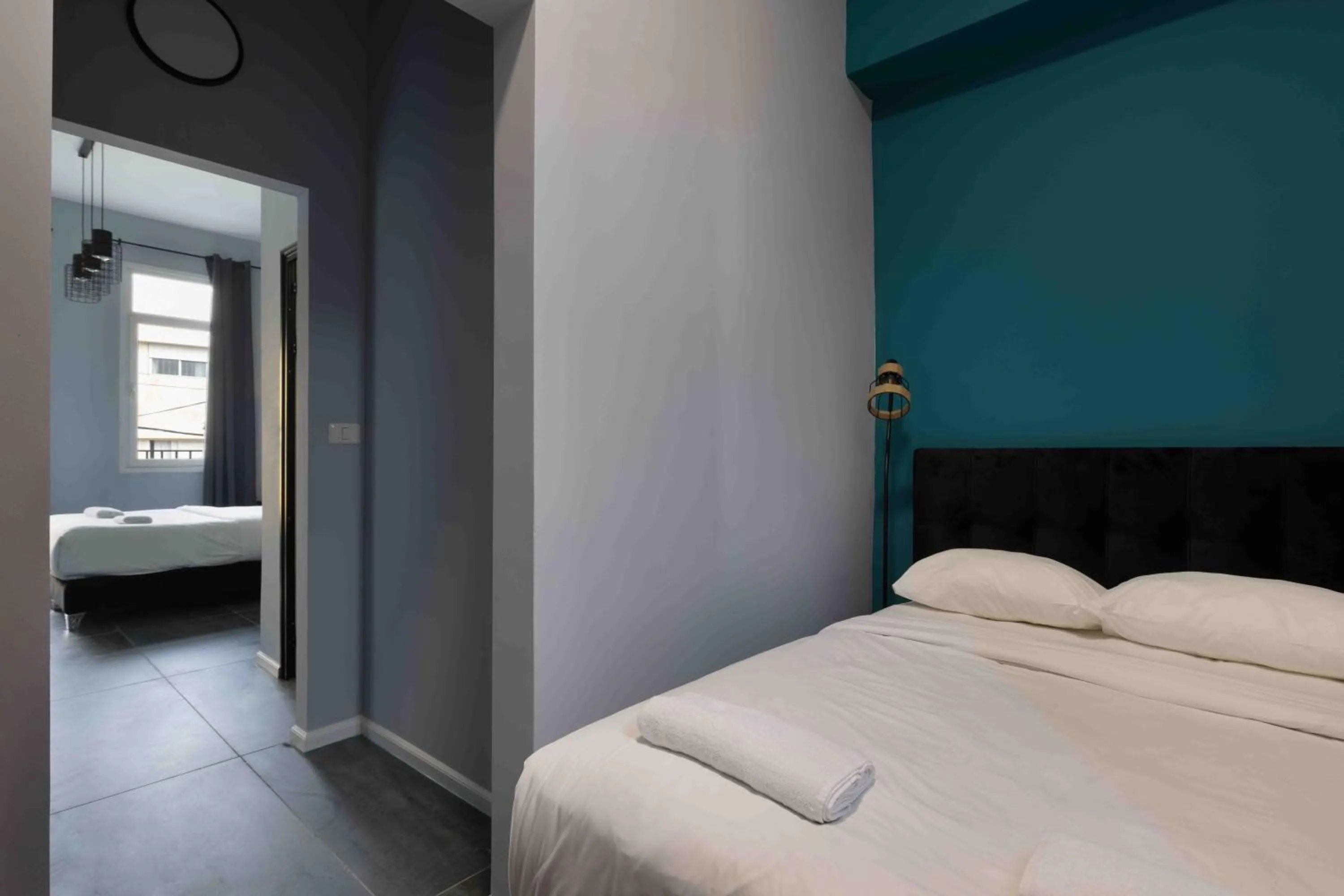 Photo of the whole room, Bed in Liber Tel Aviv Sea Shore Suites BY RAPHAEL HOTELS