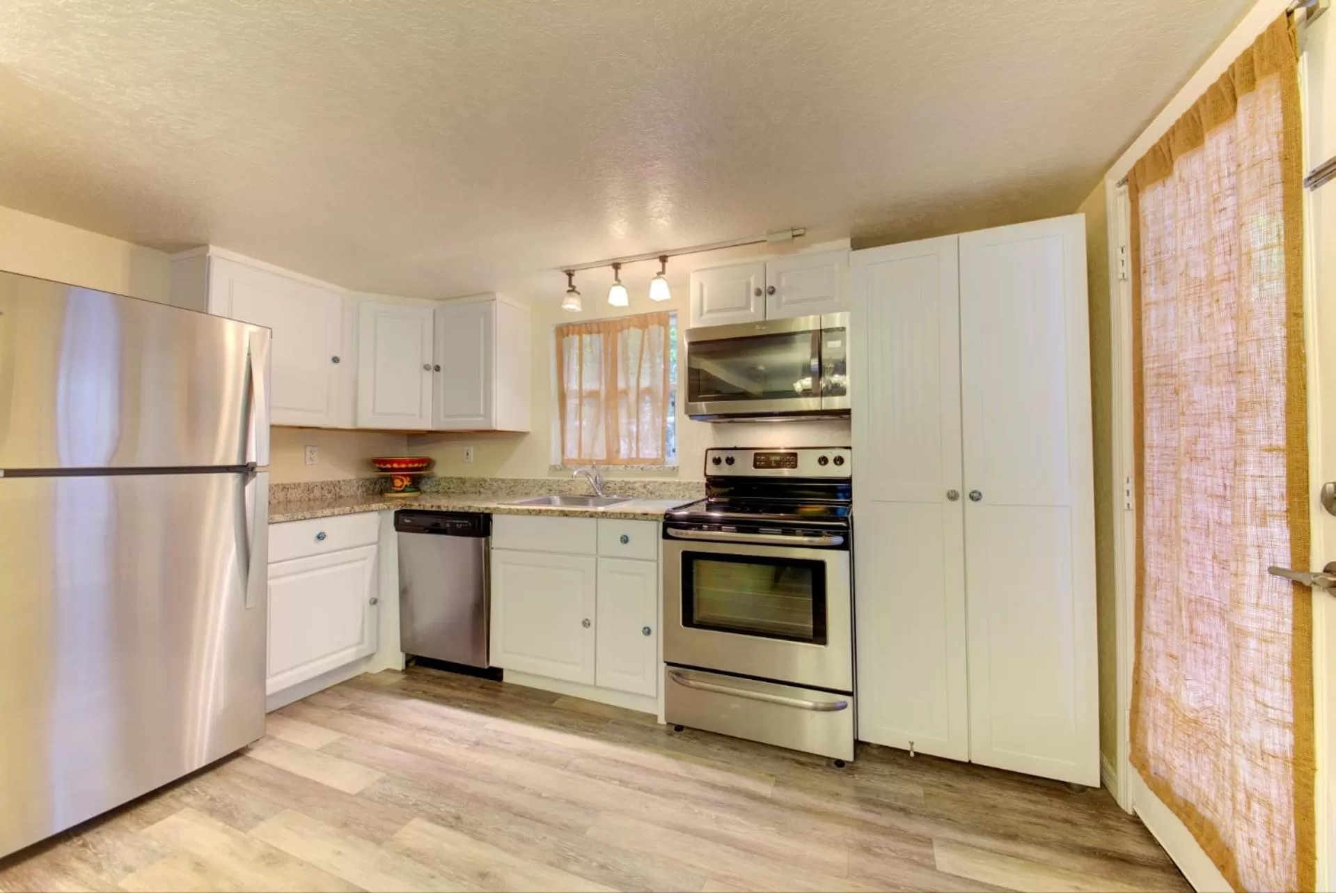 Kitchen or kitchenette in The Ringling Beach House