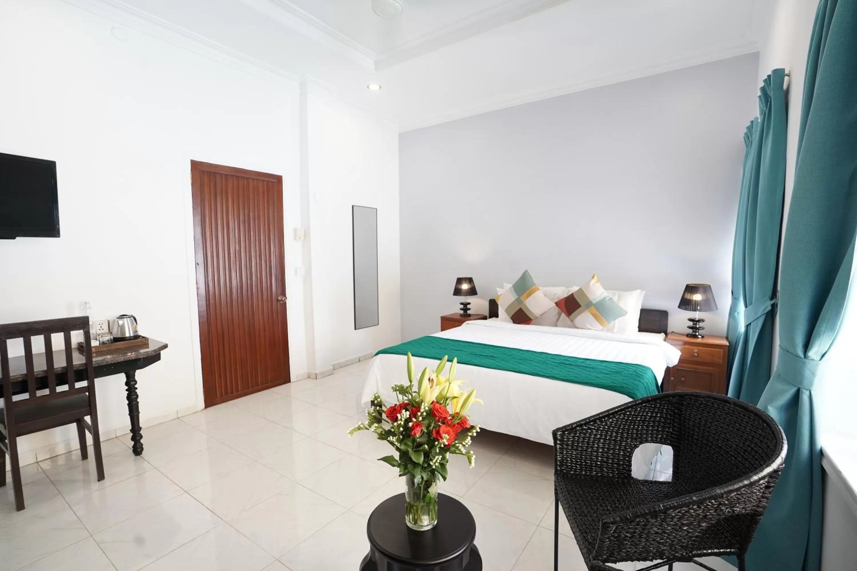 Photo of the whole room, Bed in Birdcage Boutique