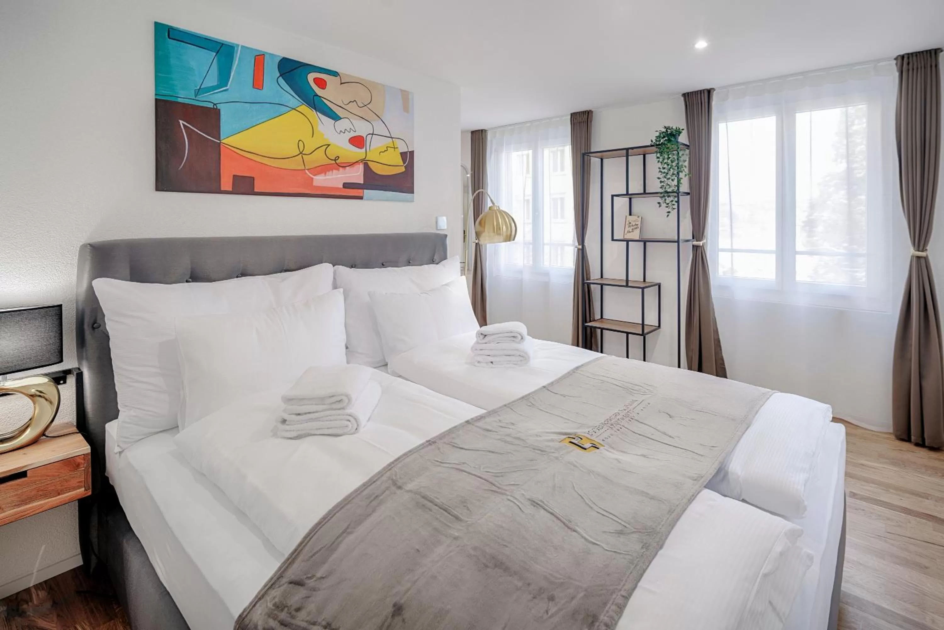 Bed in VISIMO Apartments St Georgen-Strasse St Gallen - Design City Nature