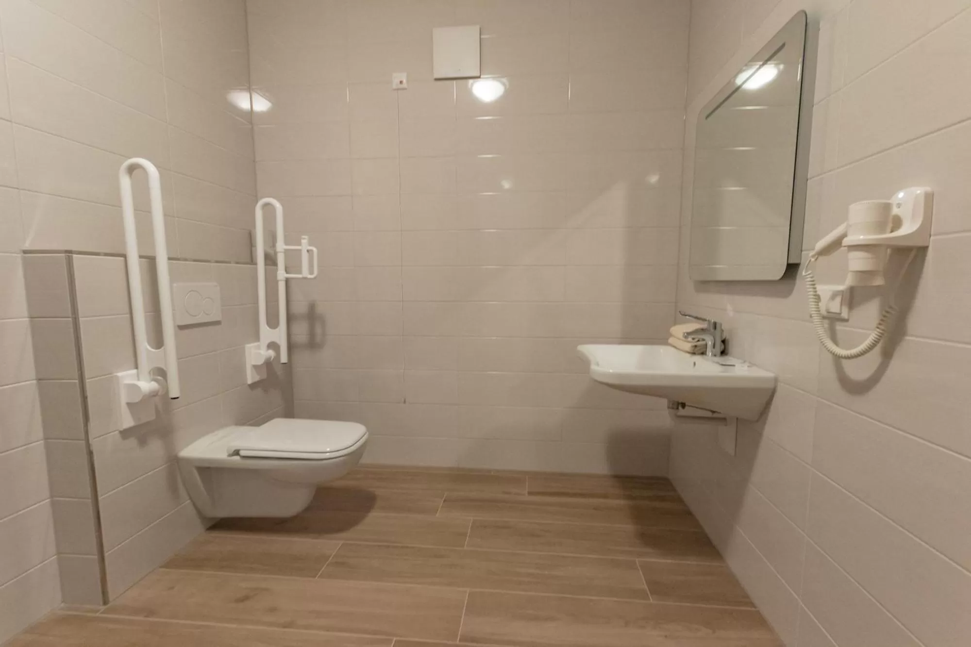 Toilet, Bathroom in Stadthotel Donauwörth