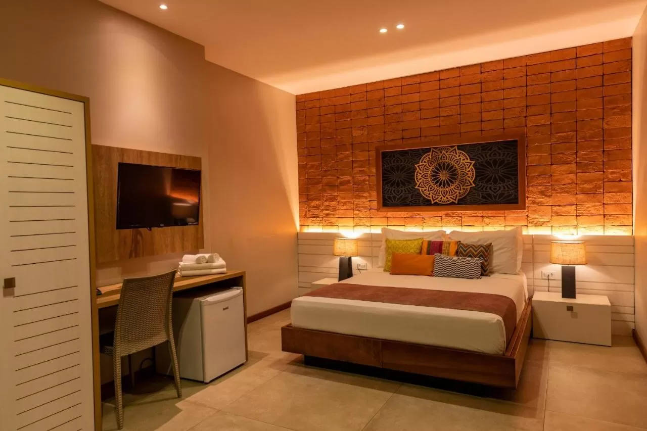 Bed in Bravo Pousada Design