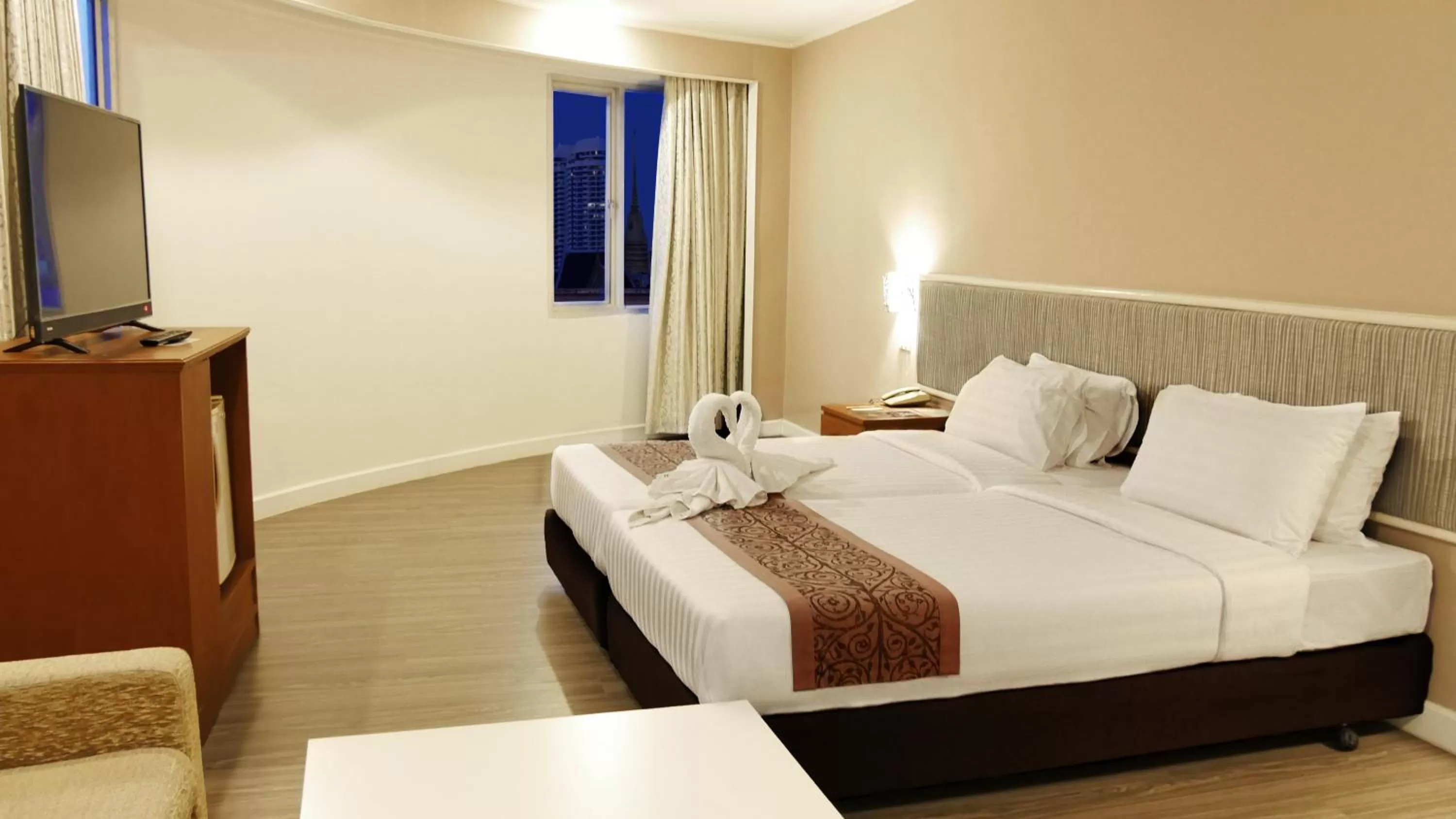 Bed in Trang Hotel Bangkok - SHA Plus