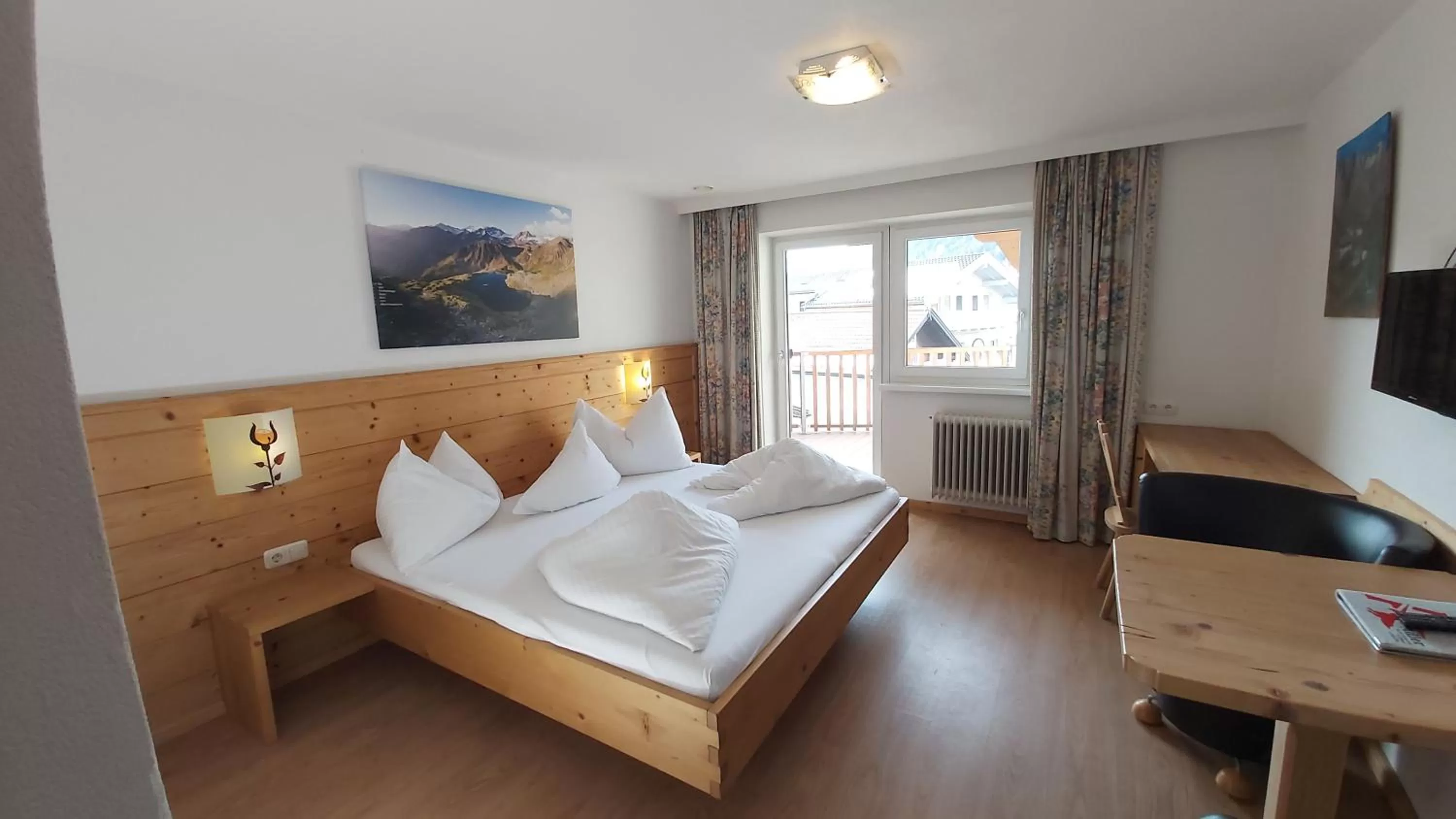 Bed in Adler Hotel-Pension