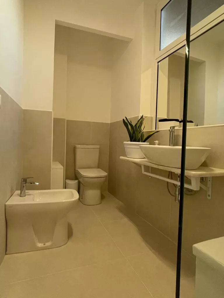 Bathroom in Cutelli Gold