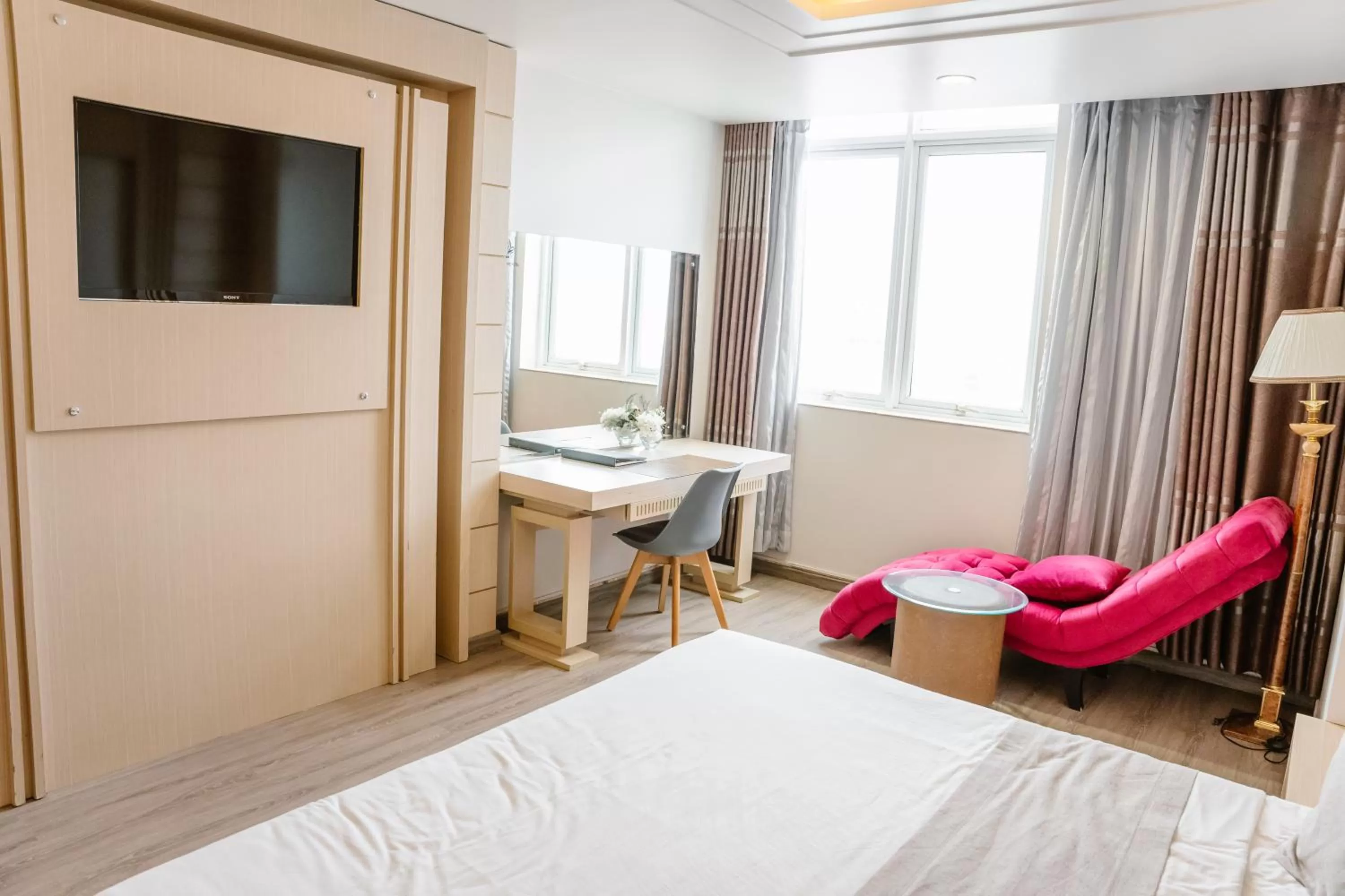 Bed in Holiday One Can Tho Hotel