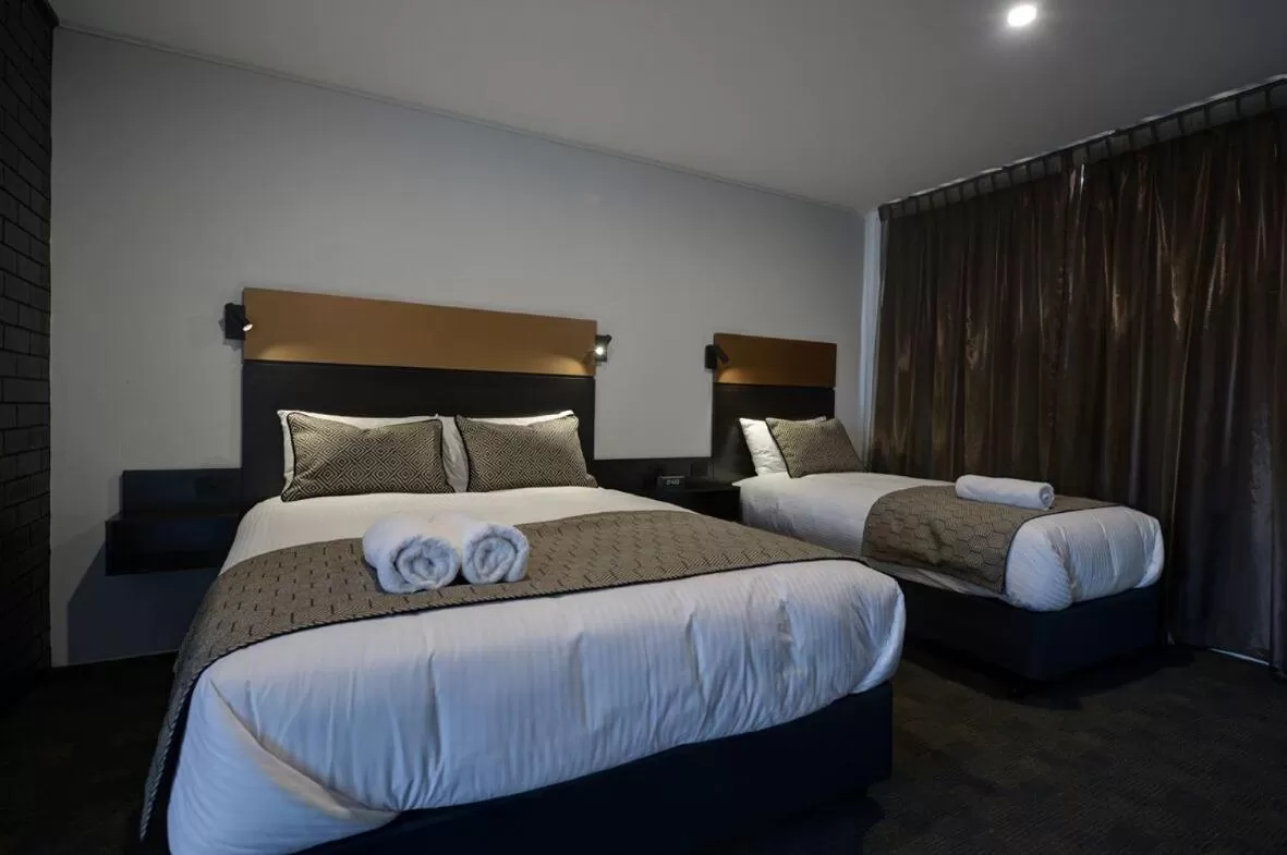 Decorative detail, Bed in CBD Motor Inn