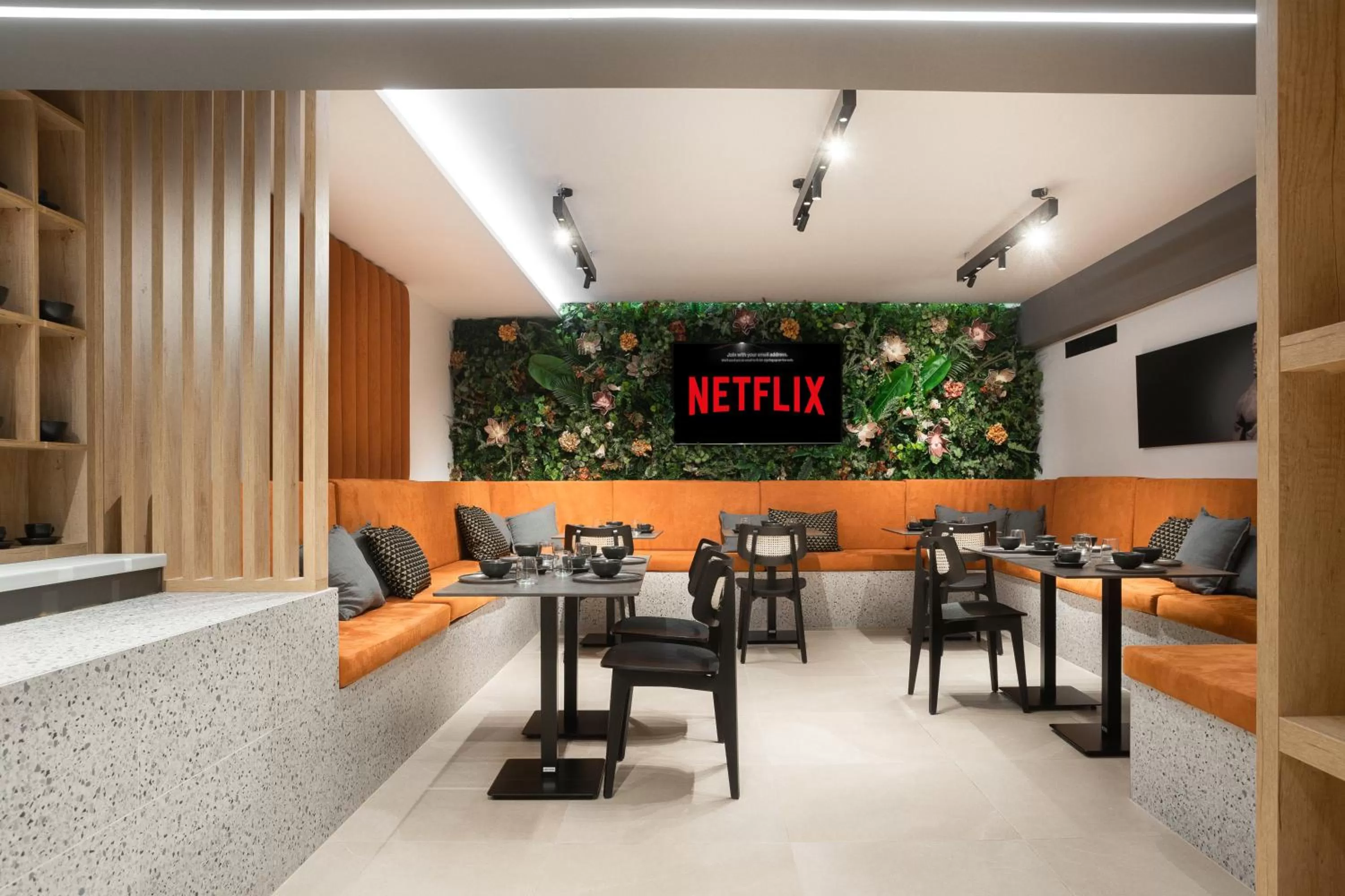 Communal lounge/ TV room in 11 Enteka Acropolis Suites