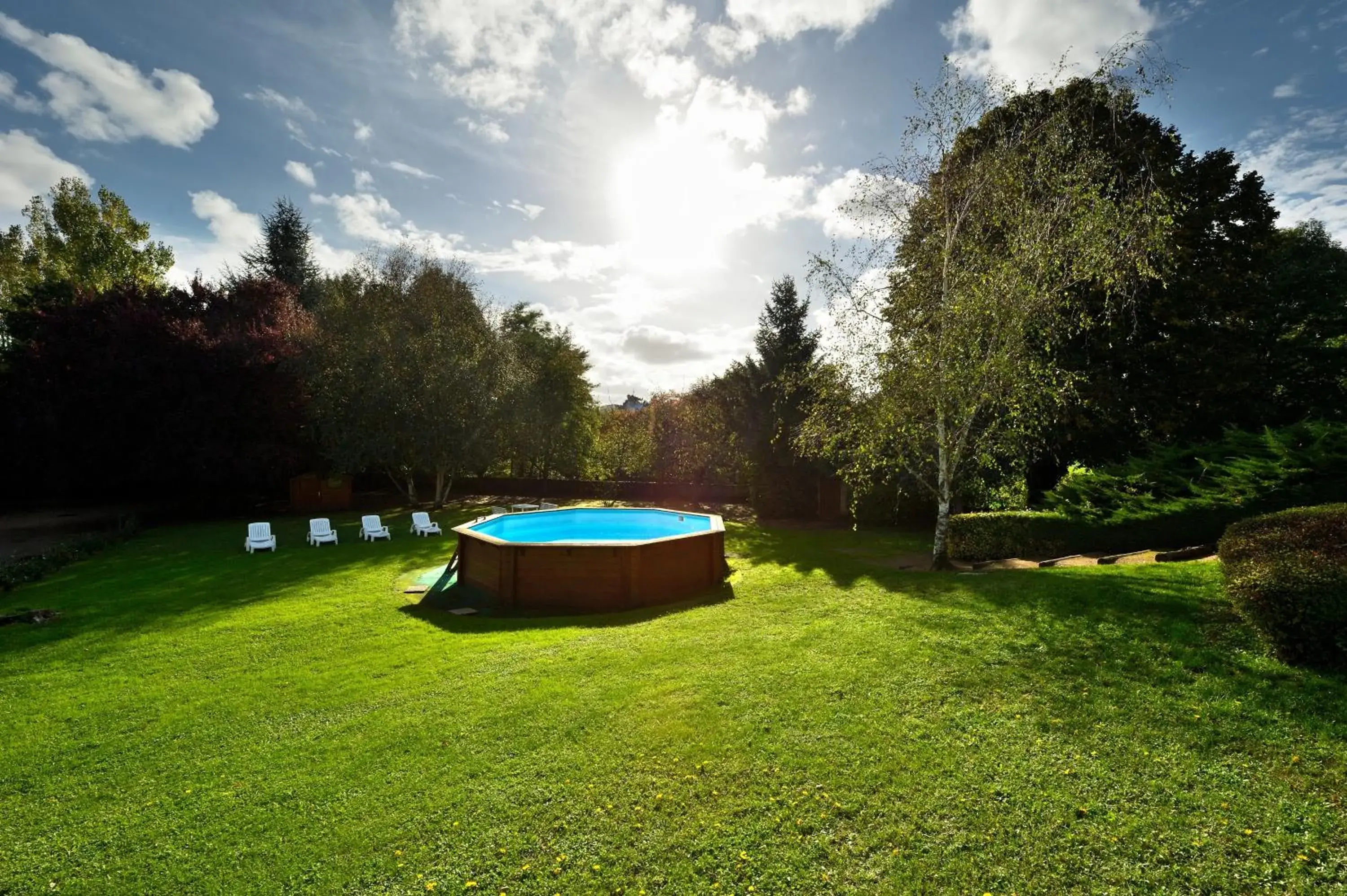Triple Room with Garden View in Logis Hôtel Restaurant Du Lion D'argent Et Des Tanneries Triple Room with Garden View in Logis Hôtel Restaurant Du Lion D'argent Et Des Tanneries