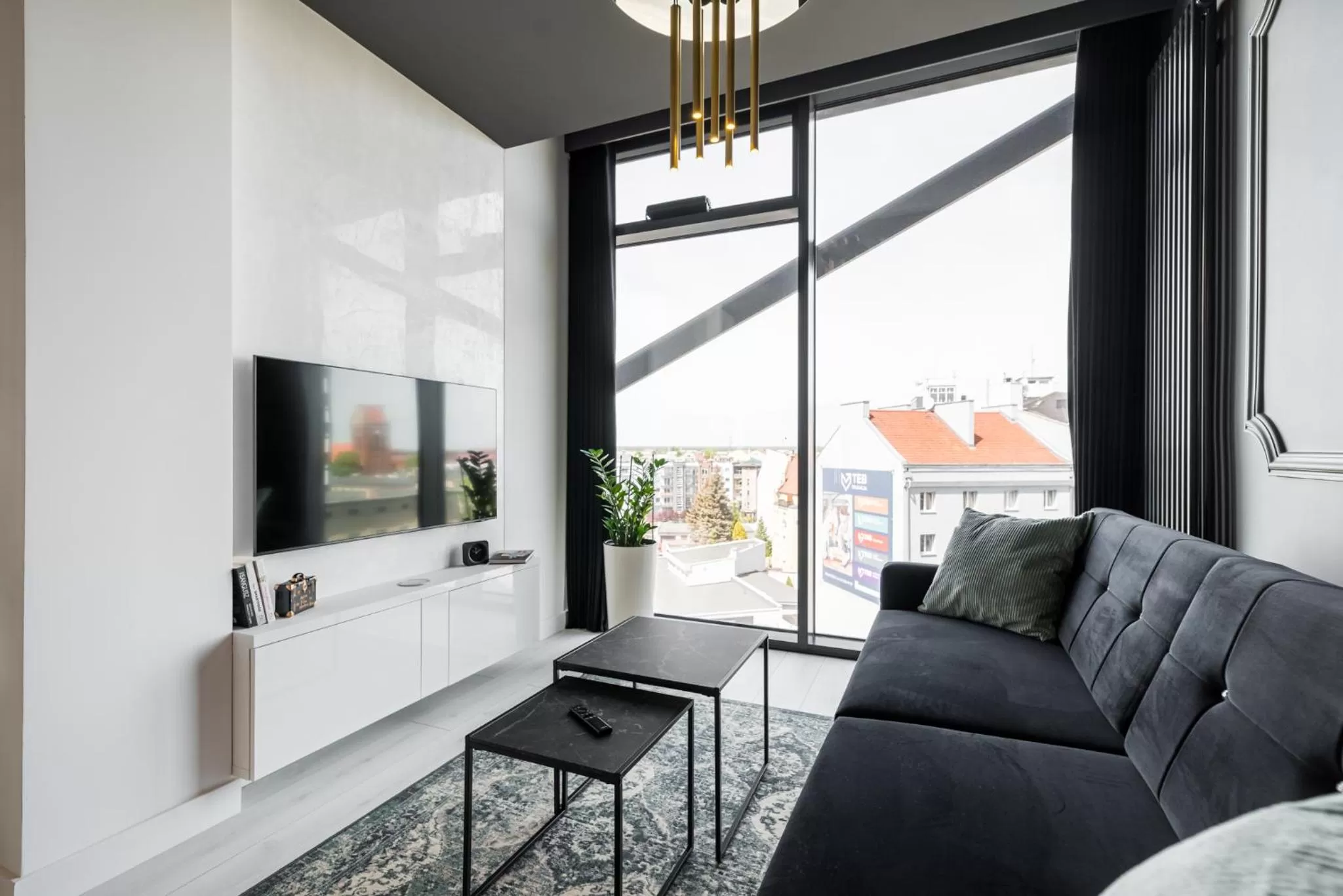 Communal lounge/ TV room in Q18 ApartHotel