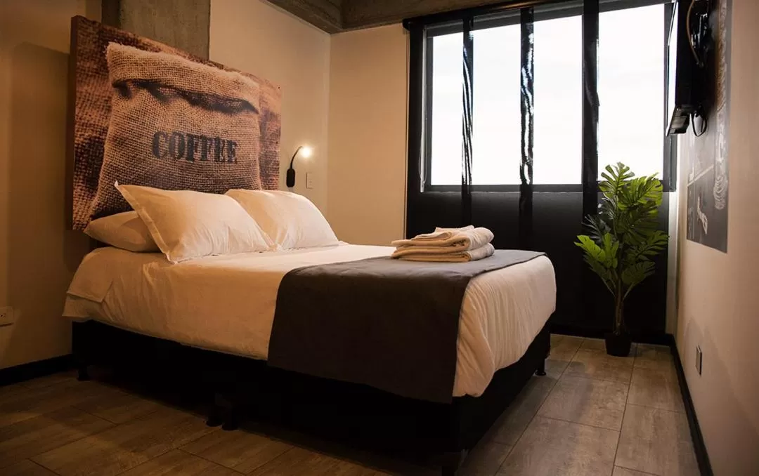 Photo of the whole room, Bed in The Coffee Club