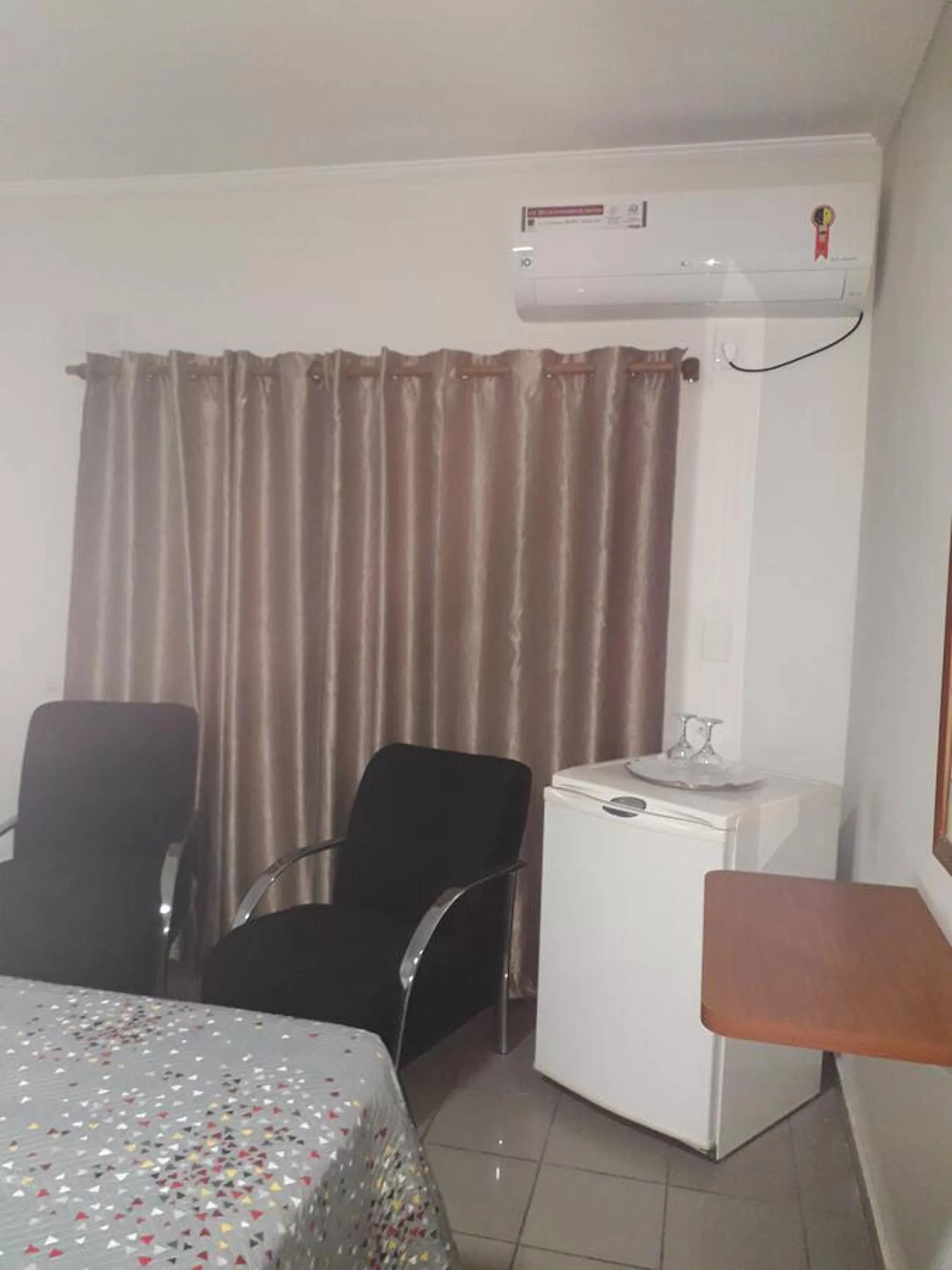 Bedroom in Hotel Athenas e Convenções