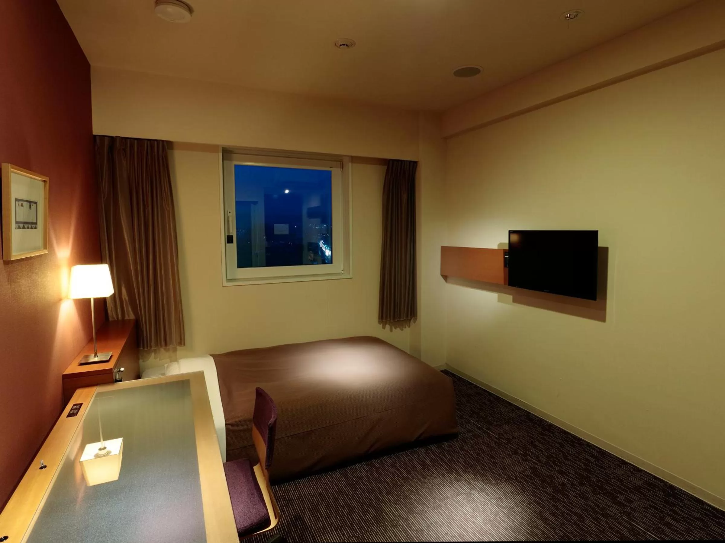 Photo of the whole room, Bed in Candeo Hotels Kameyama