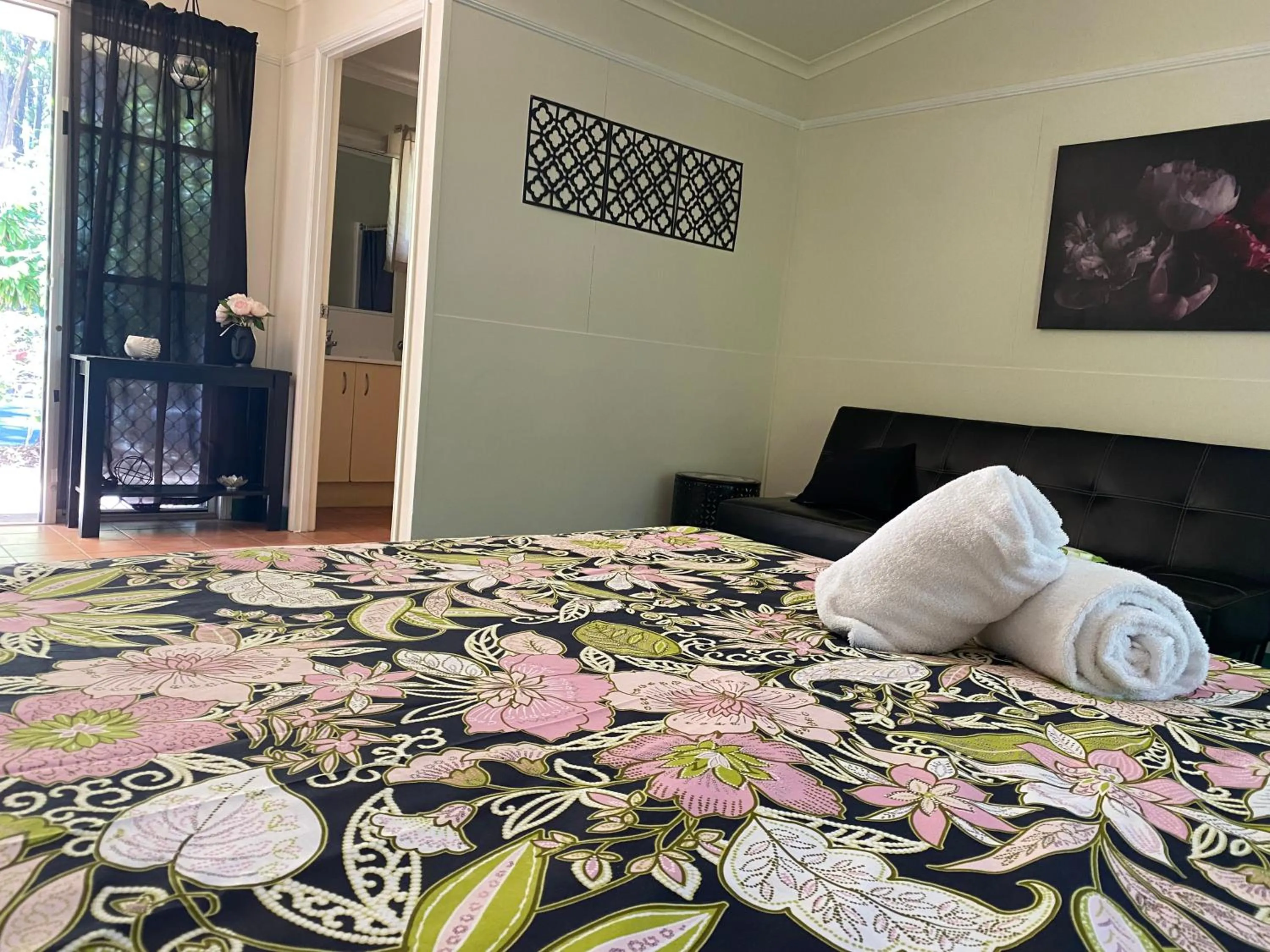 Bed in Colonial Village Resort