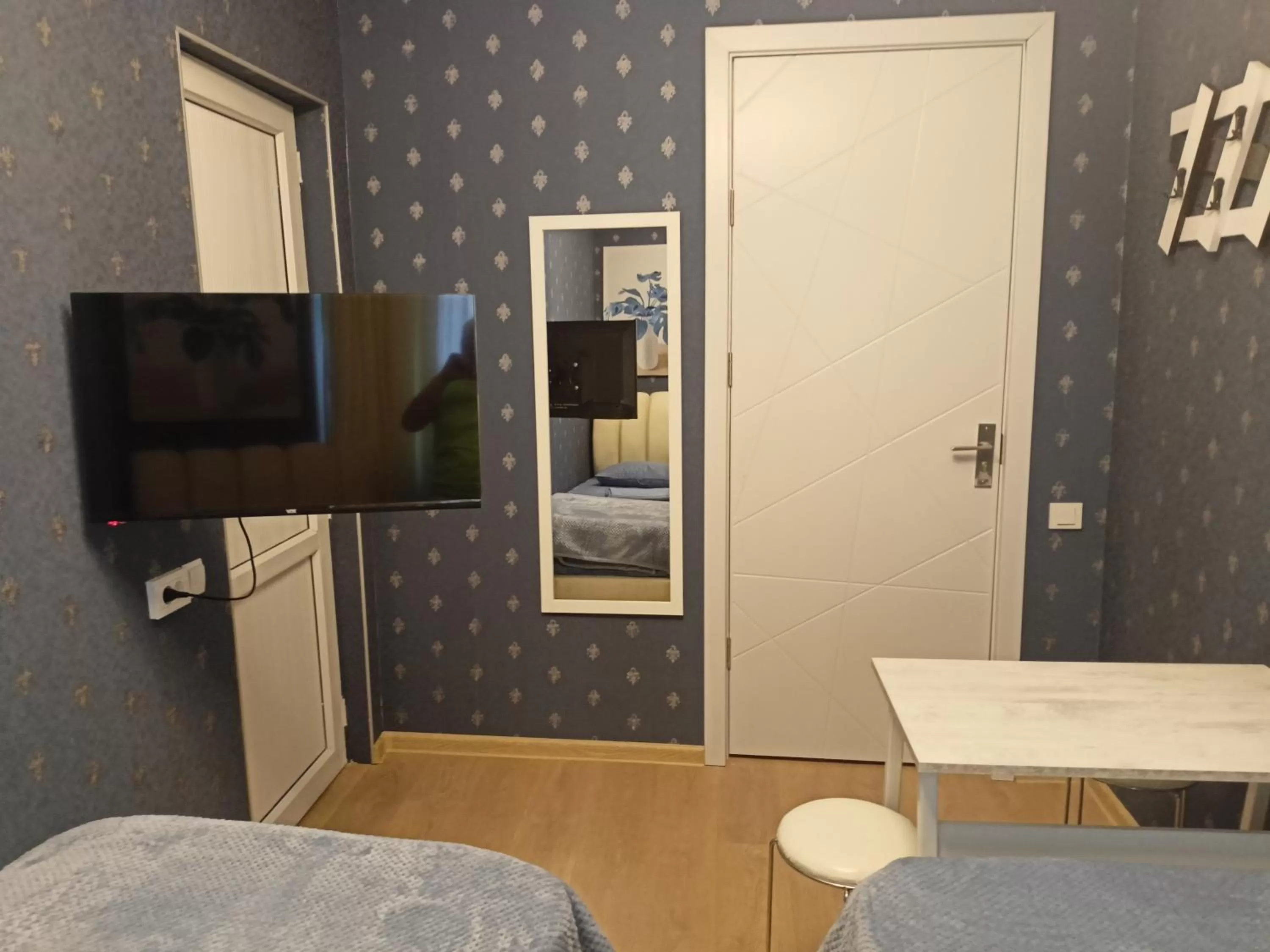 TV/Entertainment Center in Hotel Lilo near Airport