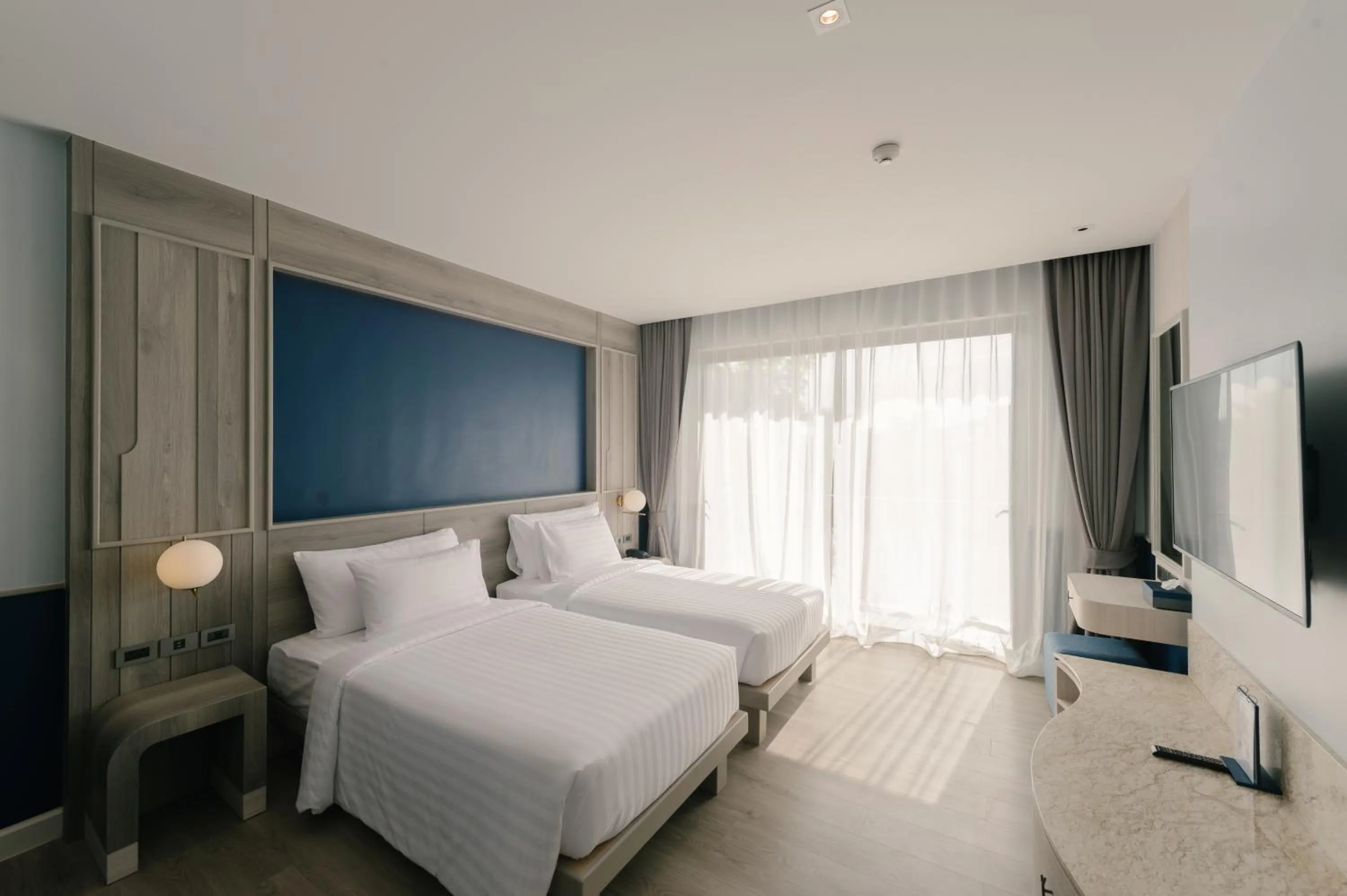 Bed in Seabed Grand Hotel Phuket - SHA Extra Plus