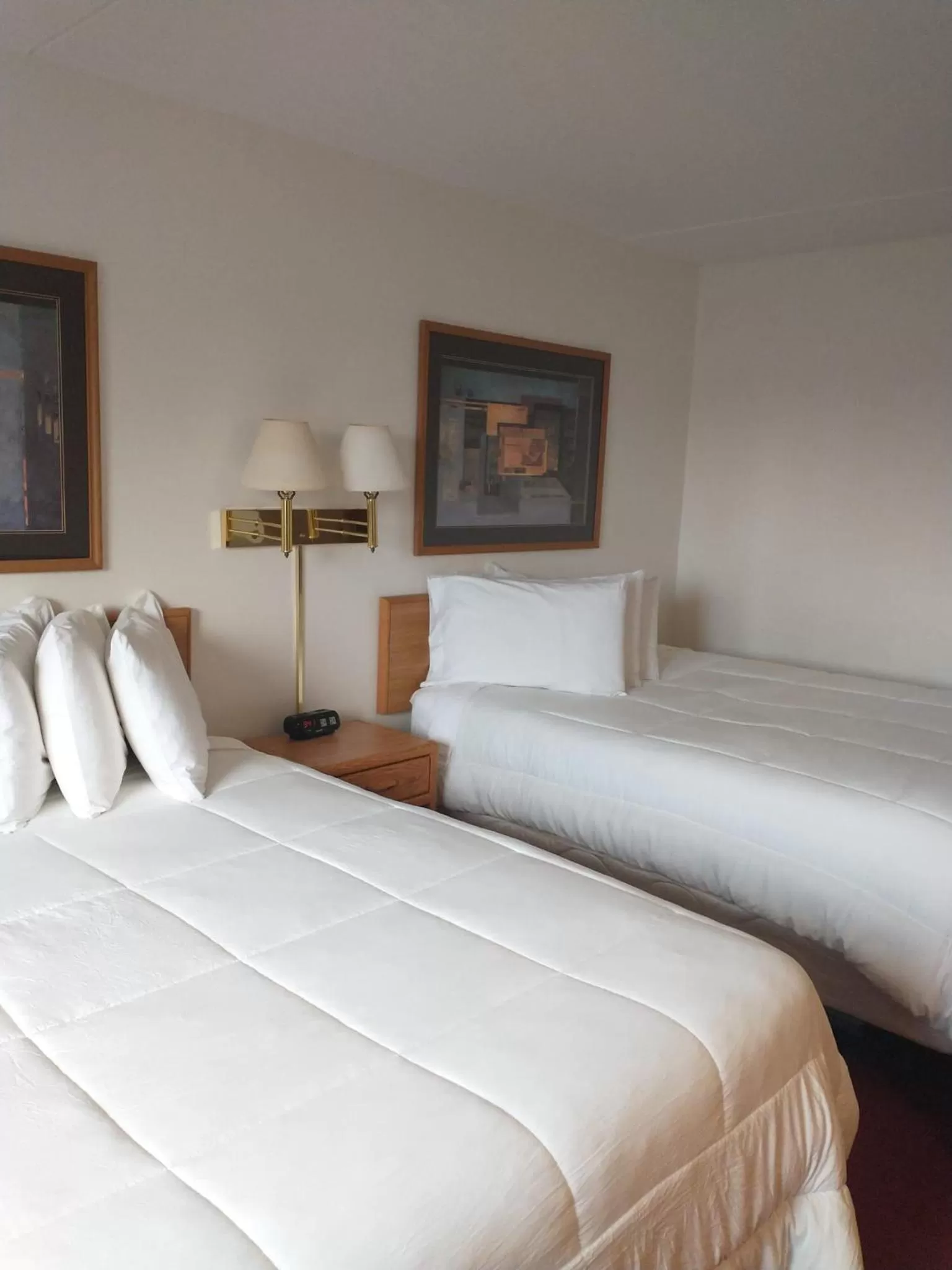 Bed in Sauk River Inn & Suites, a Travelodge by Wyndham