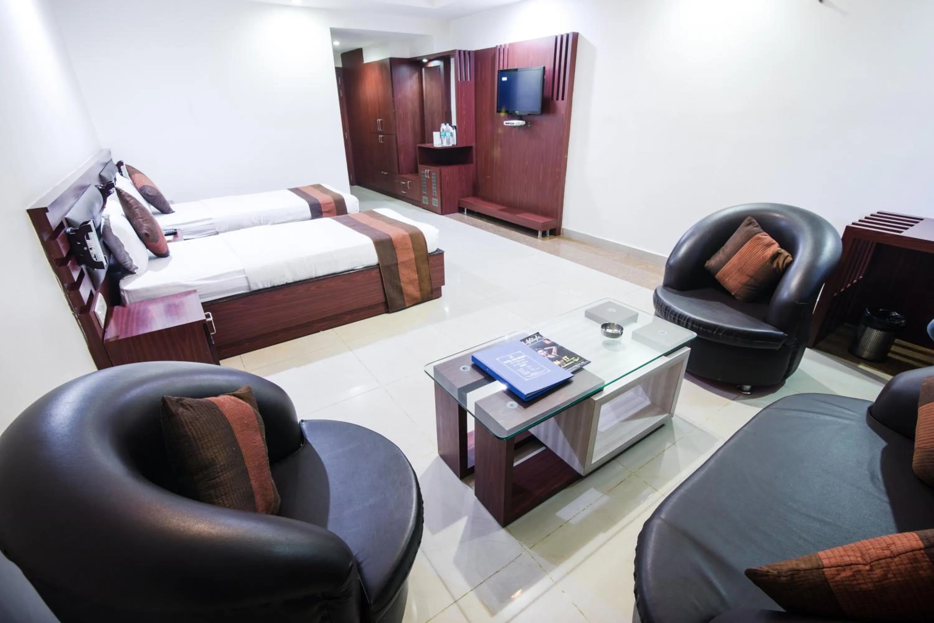 Photo of the whole room, Bed in HOTEL AVN GRAND