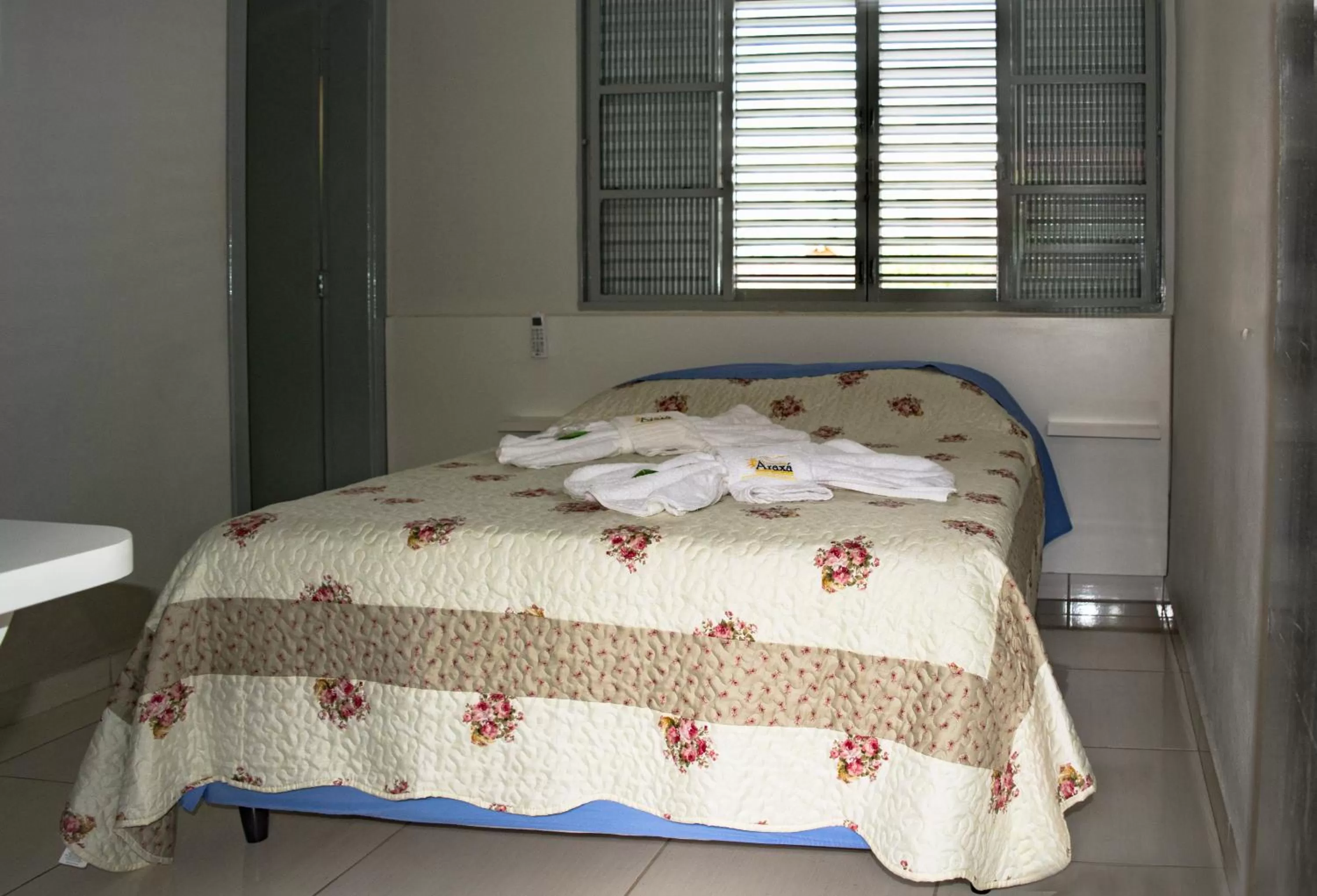 Bed in Pousada Araxá