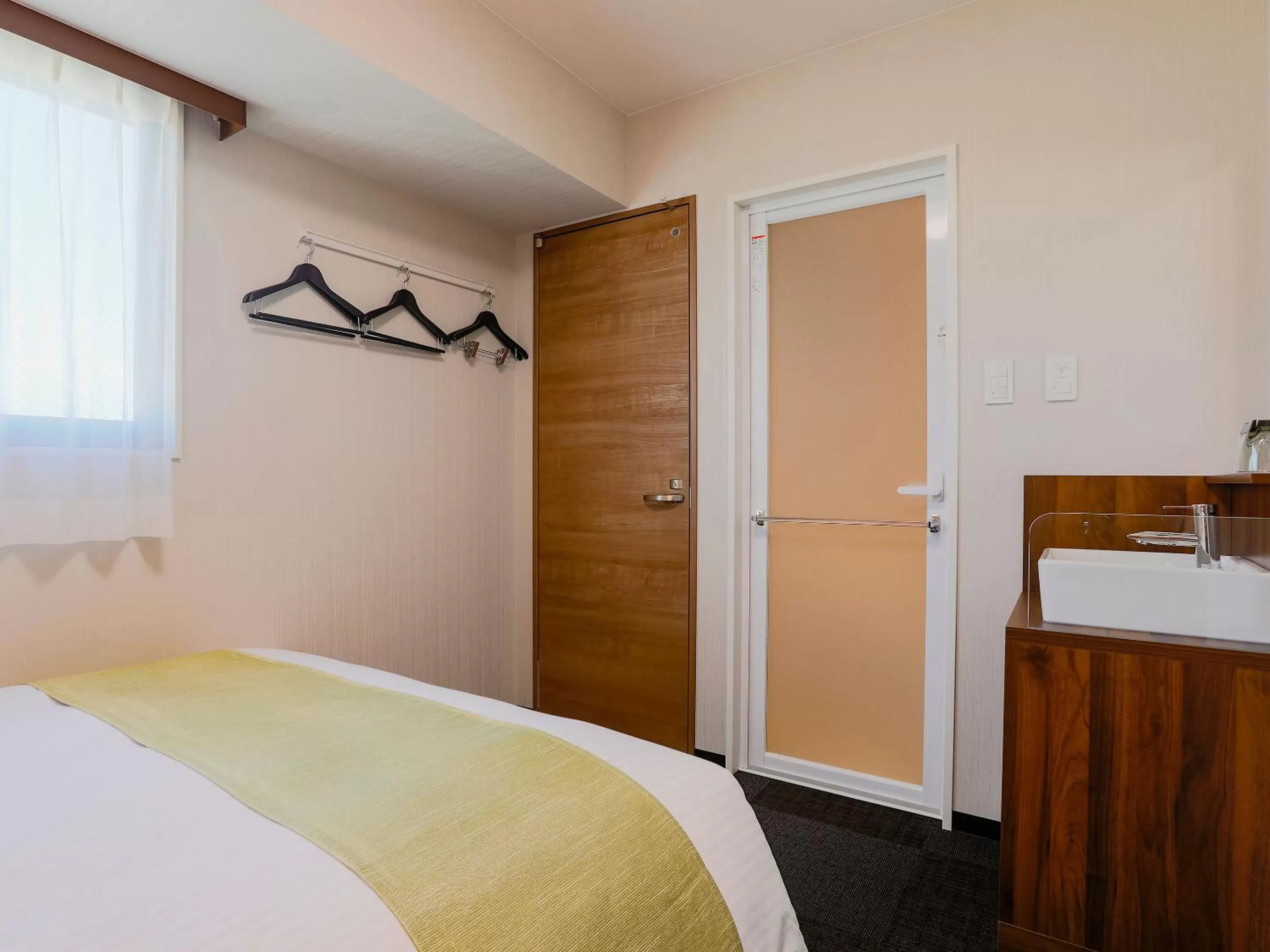 Photo of the whole room, Bed in KOKO HOTEL Takamatsu - formerly Hotel Wing Takamatsu