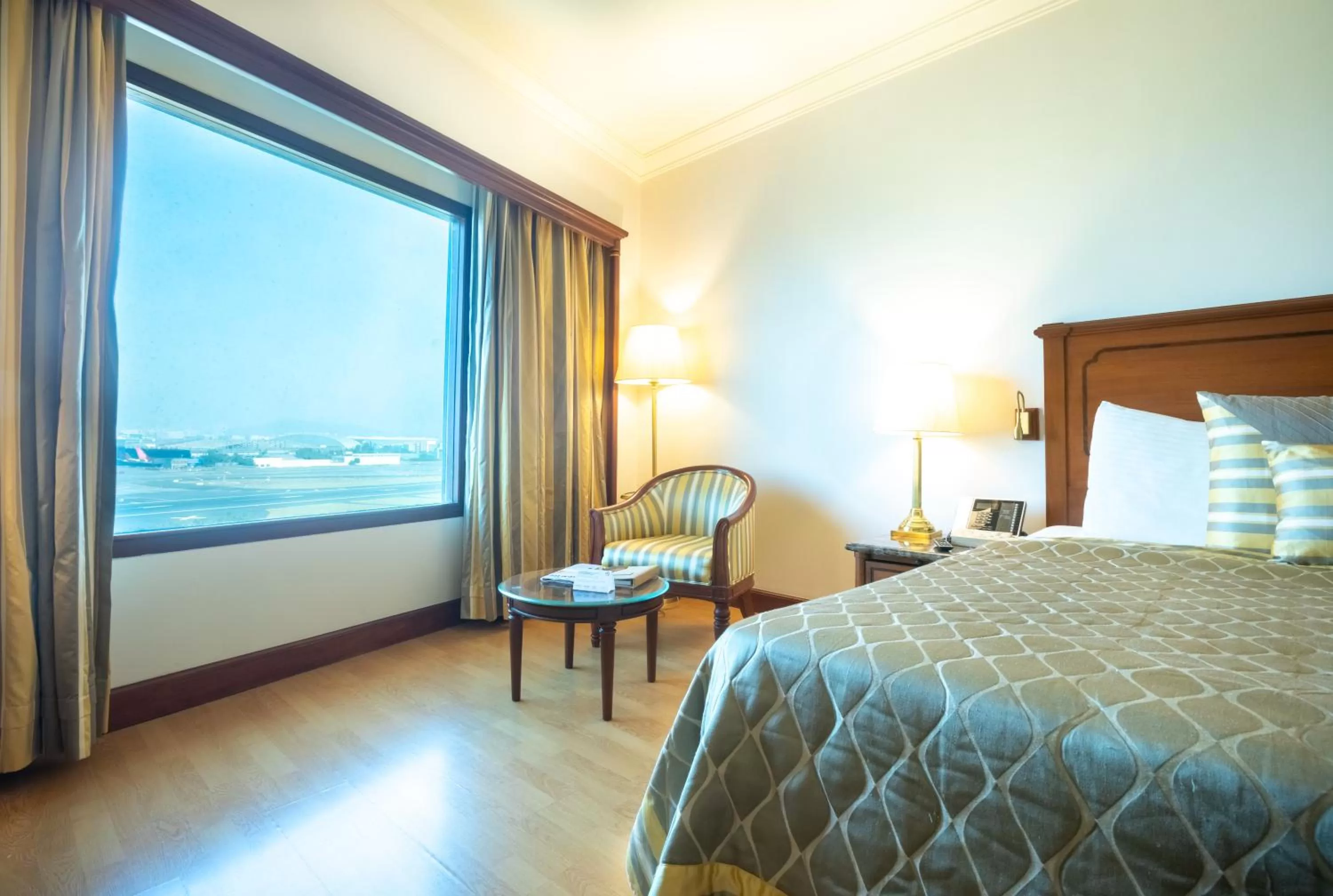 Bed in The Orchid Hotel Mumbai Vile Parle