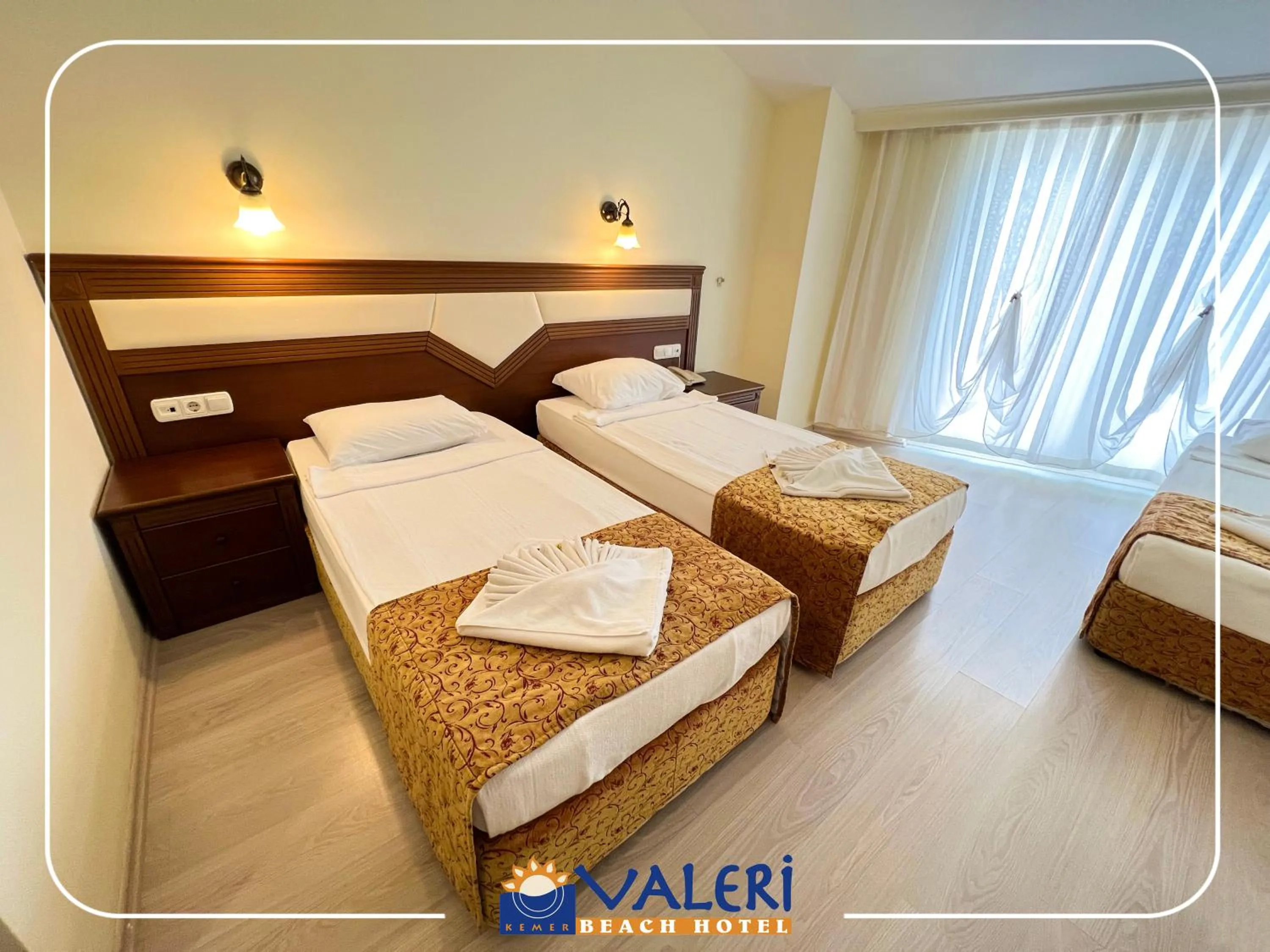 Bed in Valeri Beach Hotel