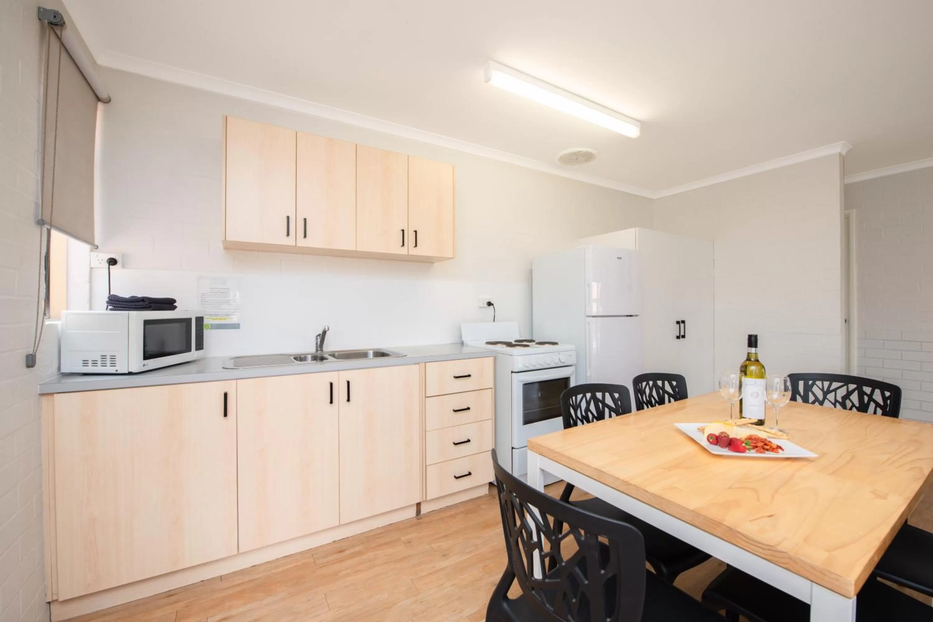 Kitchen or kitchenette in Geraldton's Ocean West Holiday Units & Short Stay Accommodation
