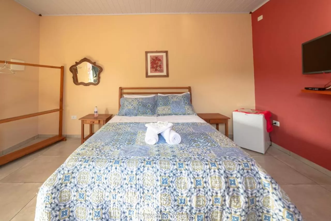 Bed in Pousada Recanto da Lu