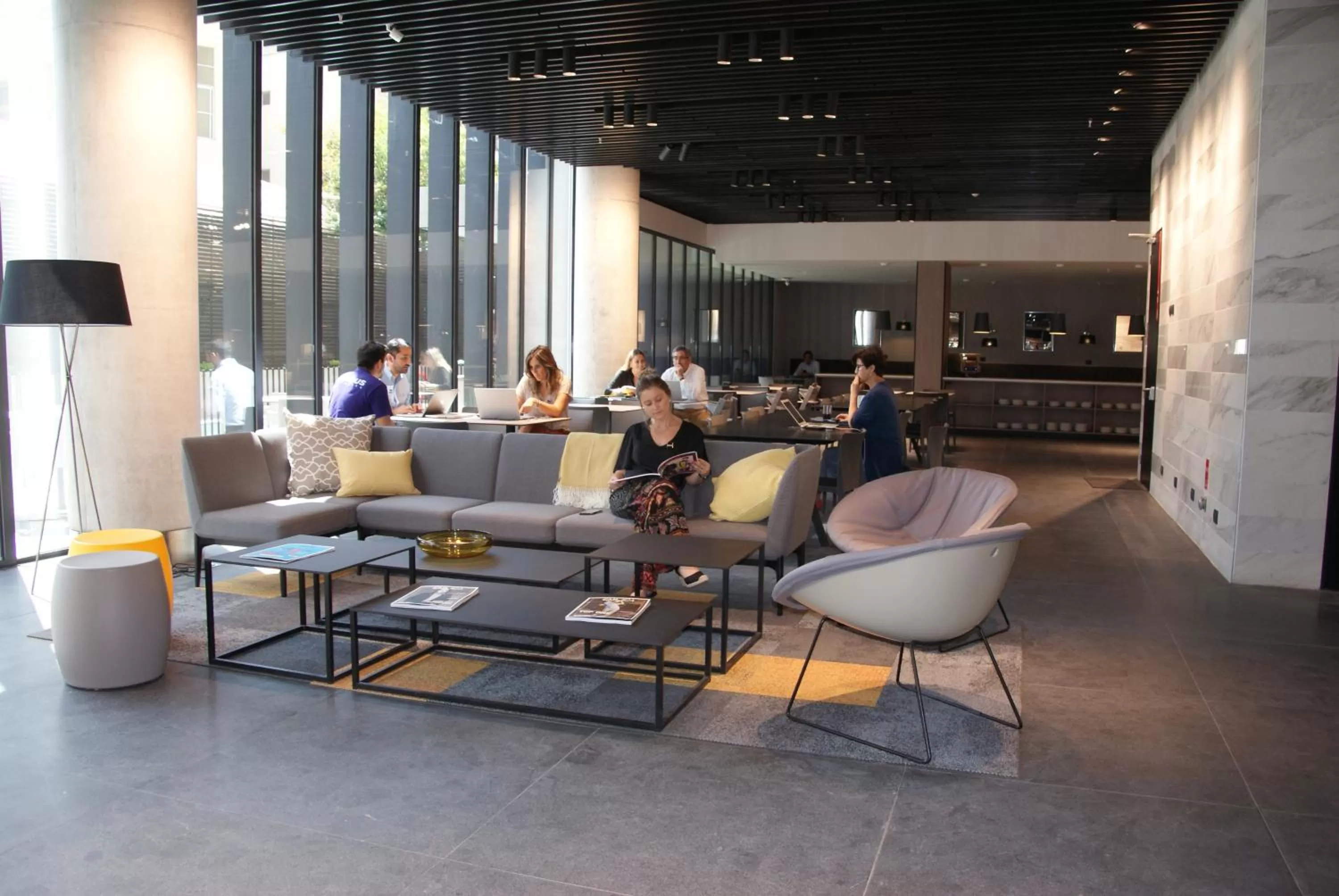 Communal lounge/ TV room in Ola Santiago Providencia, Tapestry Collection by Hilton