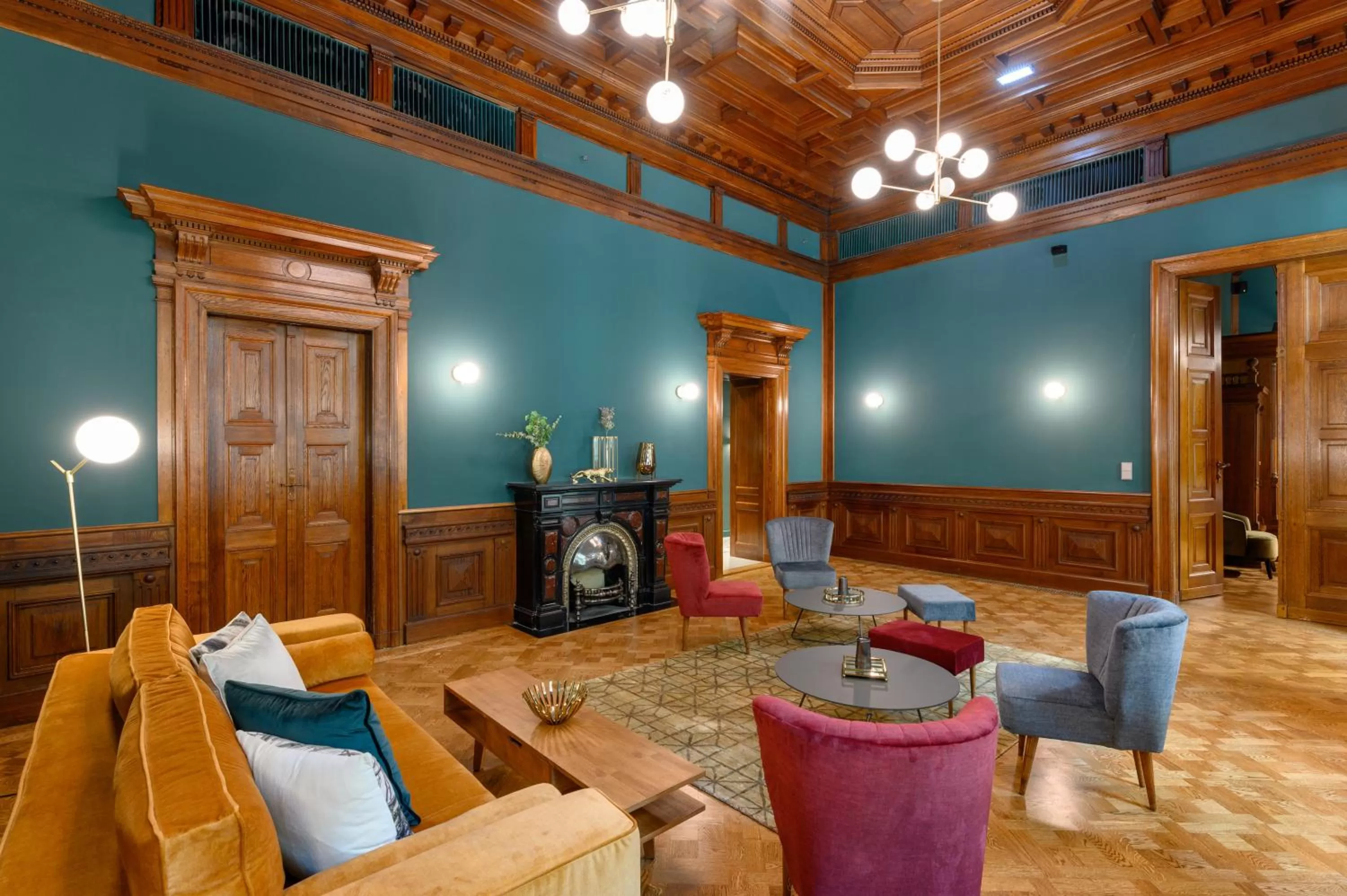 Communal lounge/ TV room in Hotel Oktogon Haggenmacher by Continental Group