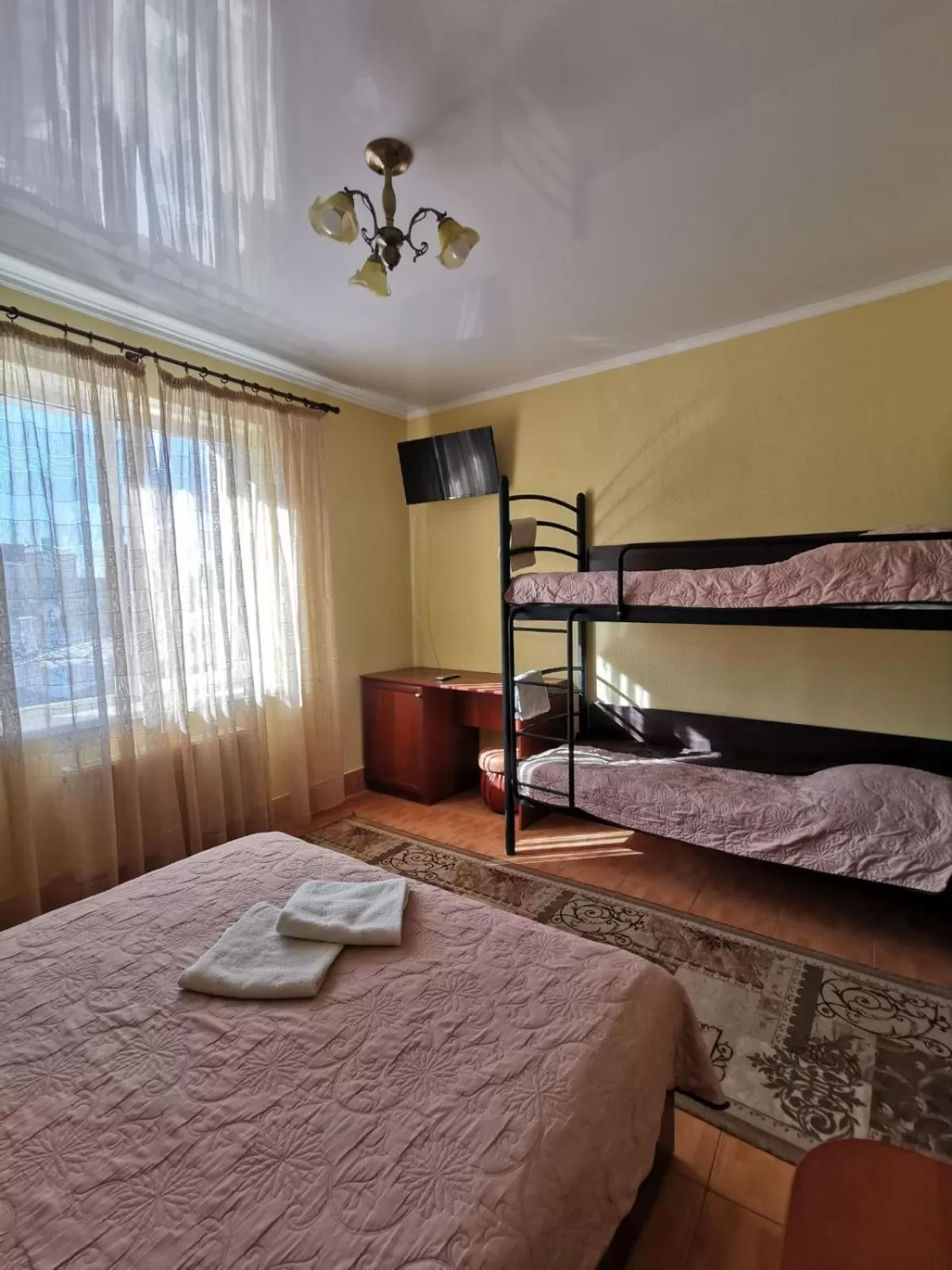 Bed in Monte-Kristo Hotel