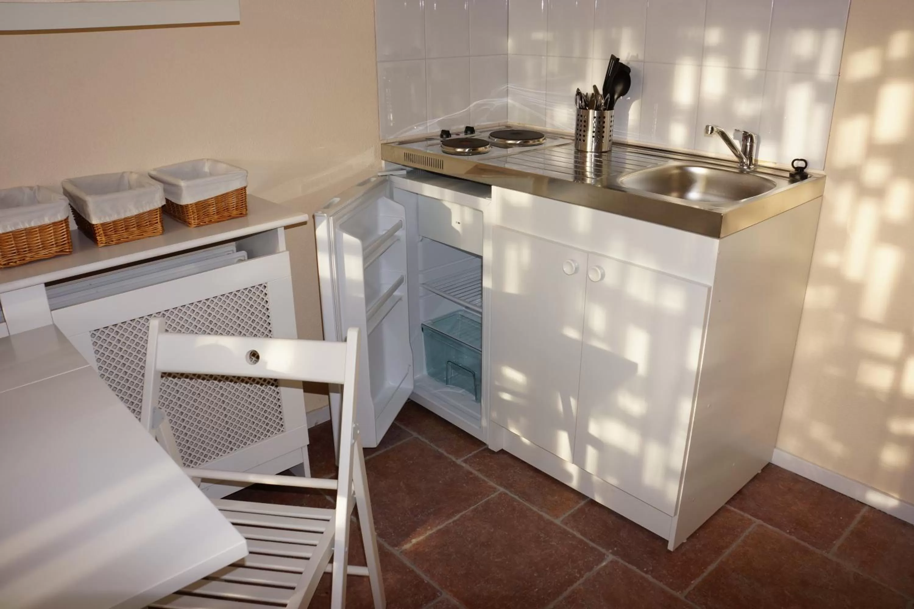 Kitchen or kitchenette in Quarenta Studio