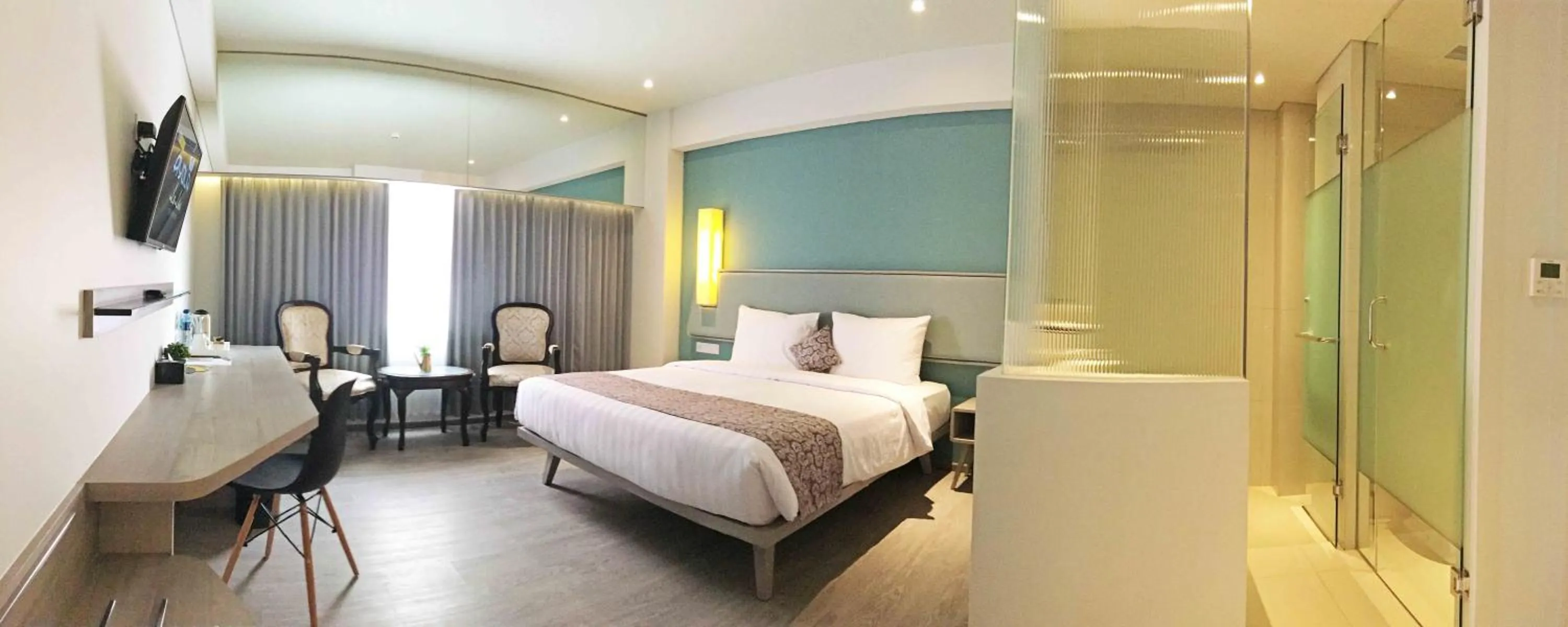 Bed in La Lisa Hotel Surabaya