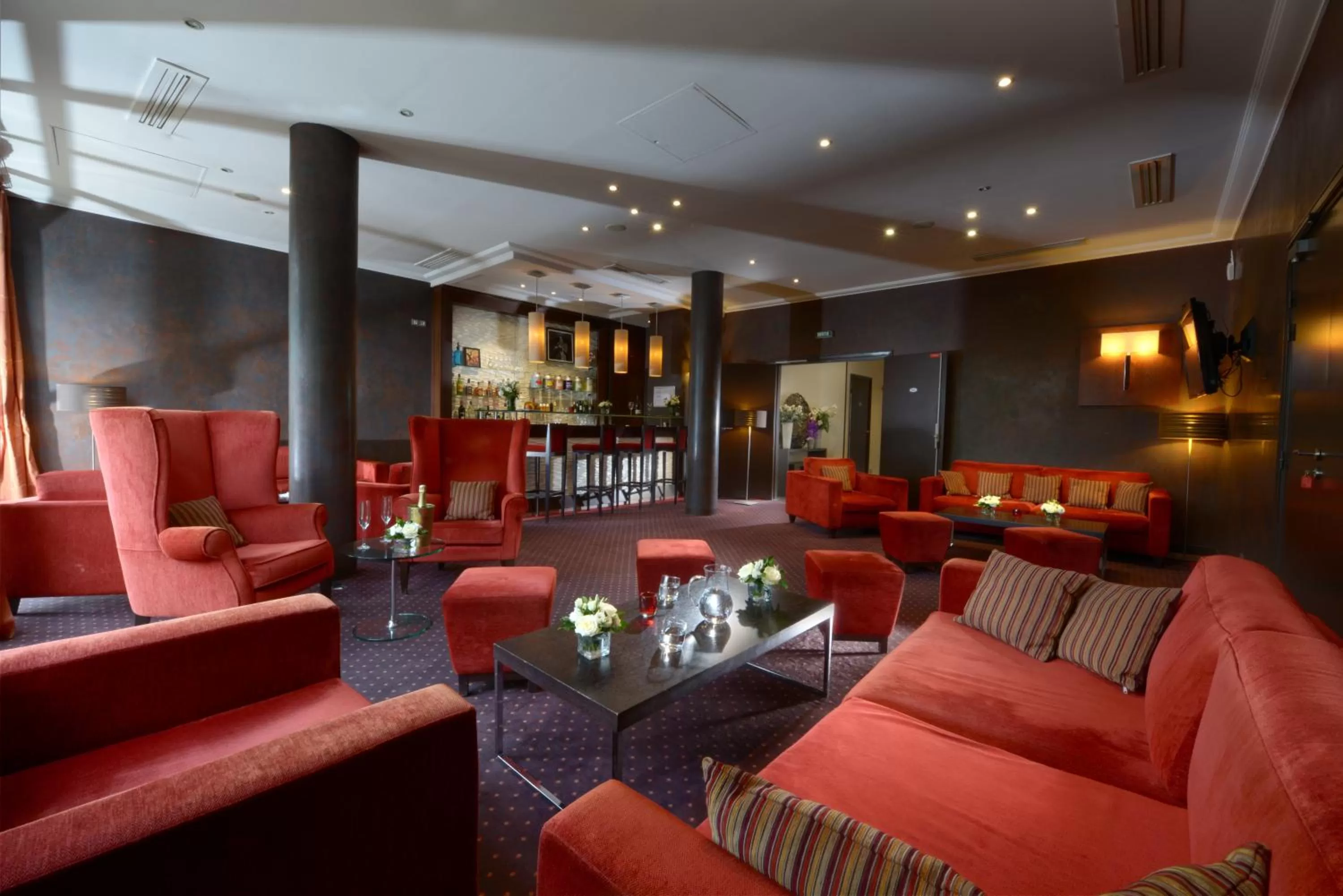 Communal lounge/ TV room in Hotel de Berny